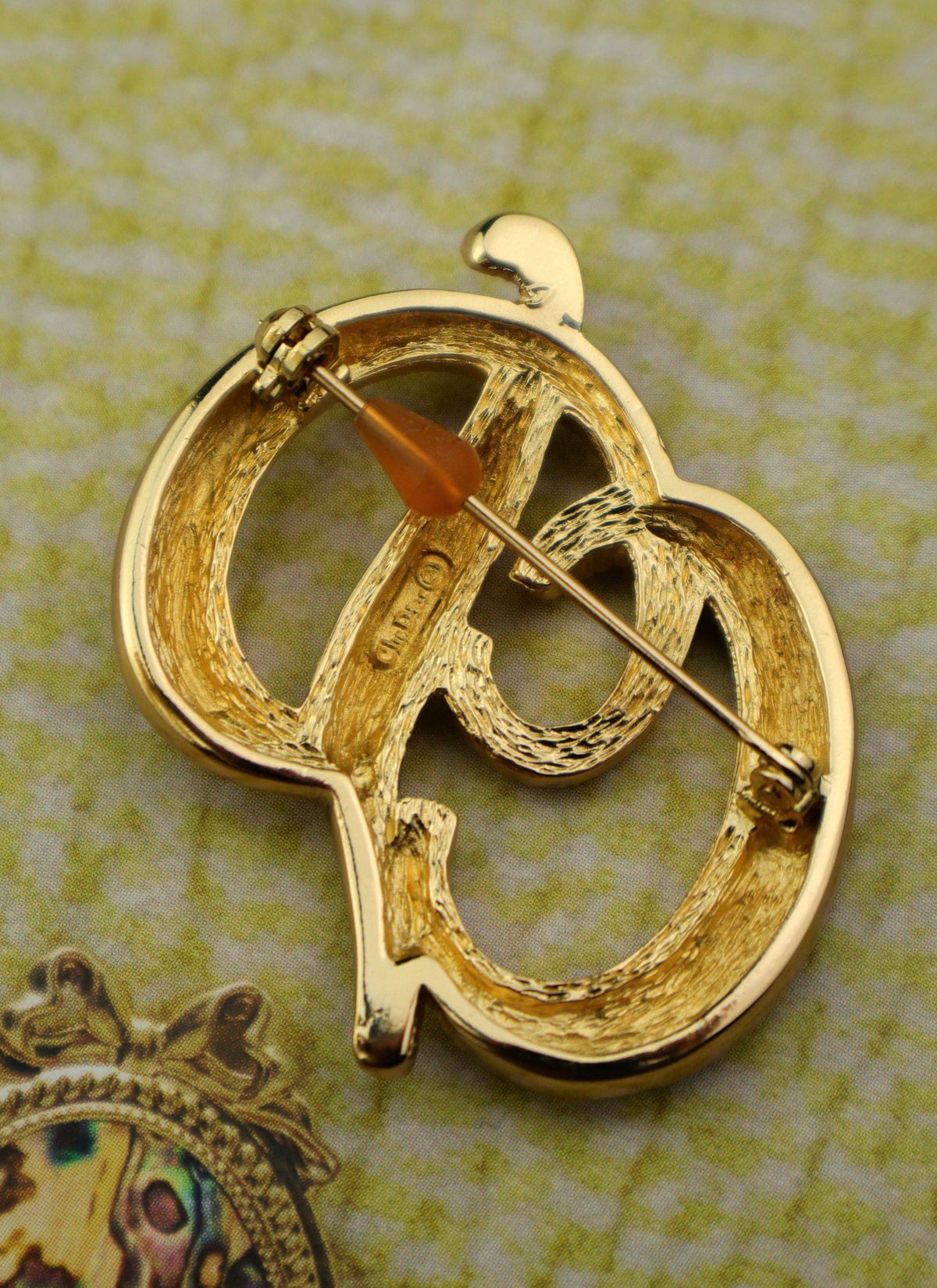 Christian Dior vintage broszka spleciony monogram CD