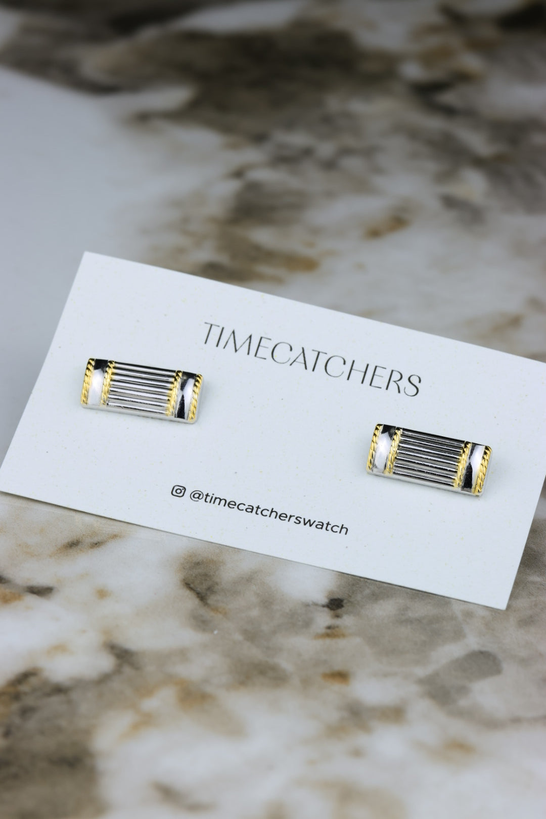 Nina Ricci – stalowe prostokątne spinki z pozłacanym akcentem (SP006)