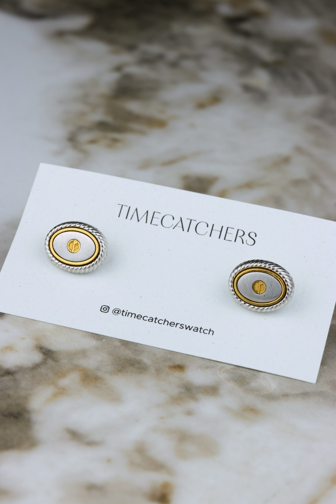 Dunhill – stalowo-złocone owalne spinki z logo (SP007)