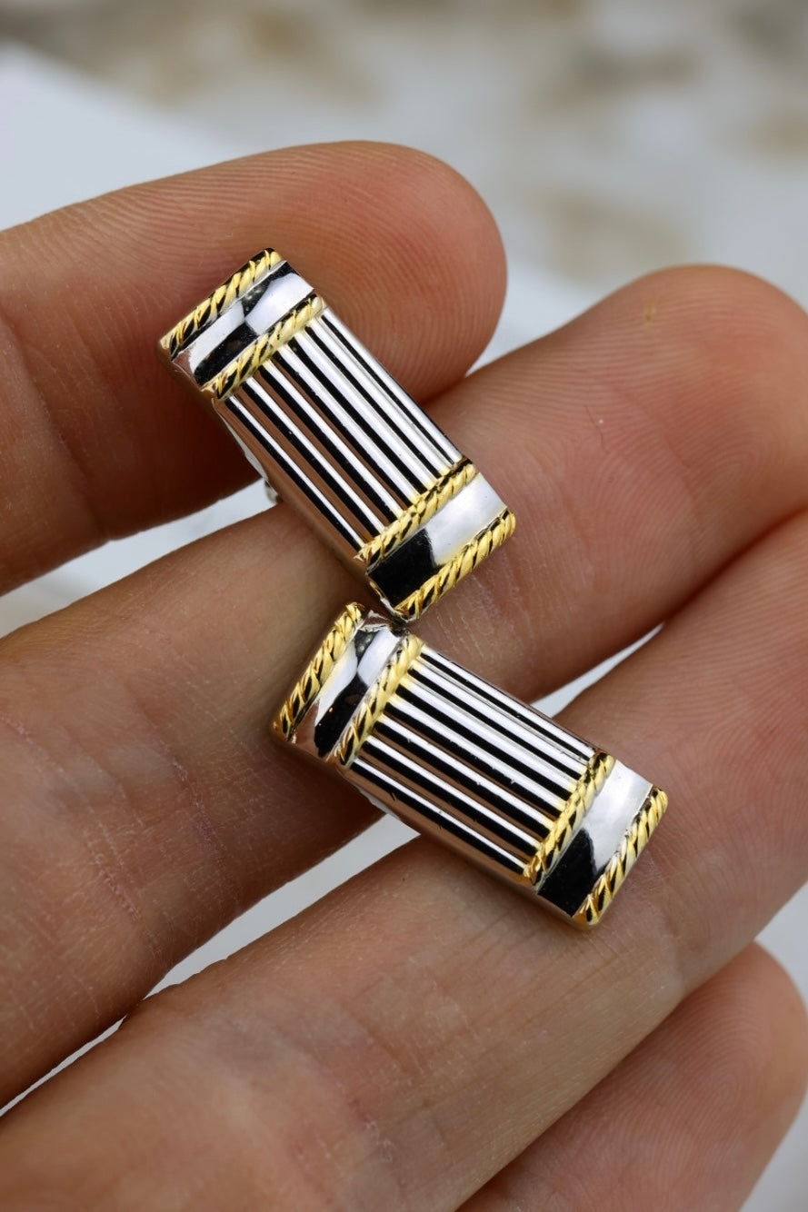 Nina Ricci – stalowe prostokątne spinki z pozłacanym akcentem (SP006)