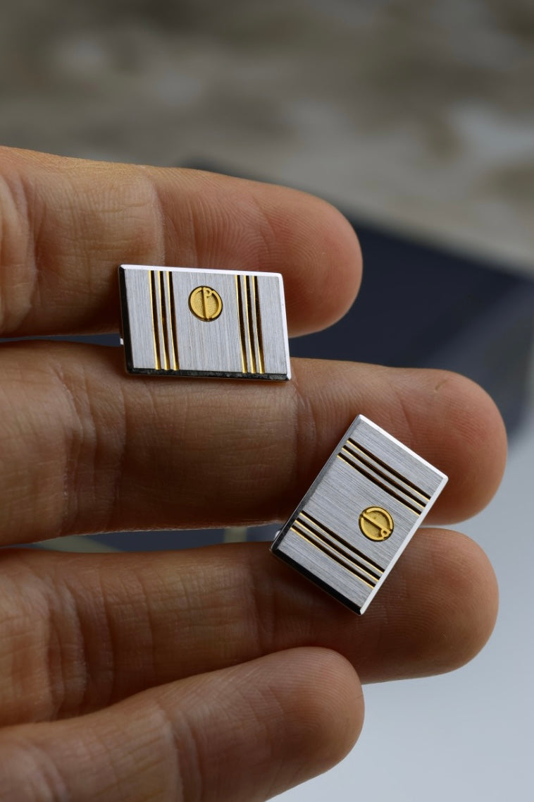 Dunhill – spinki do mankietów i spinka do krawatu, stal szczotkowana ze złotymi akcentami (S39)
