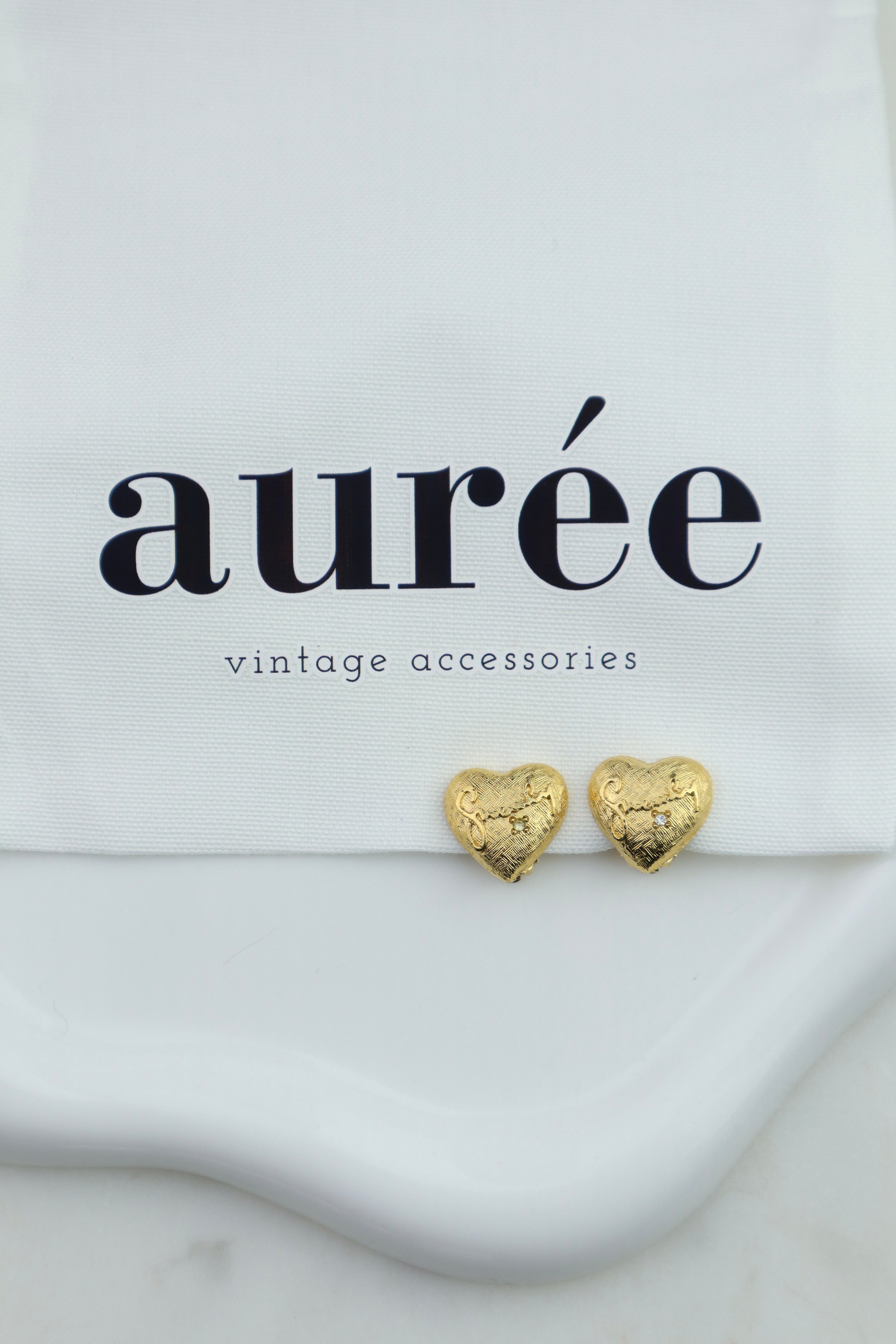 Givenchy - pozłacane klipsy serce