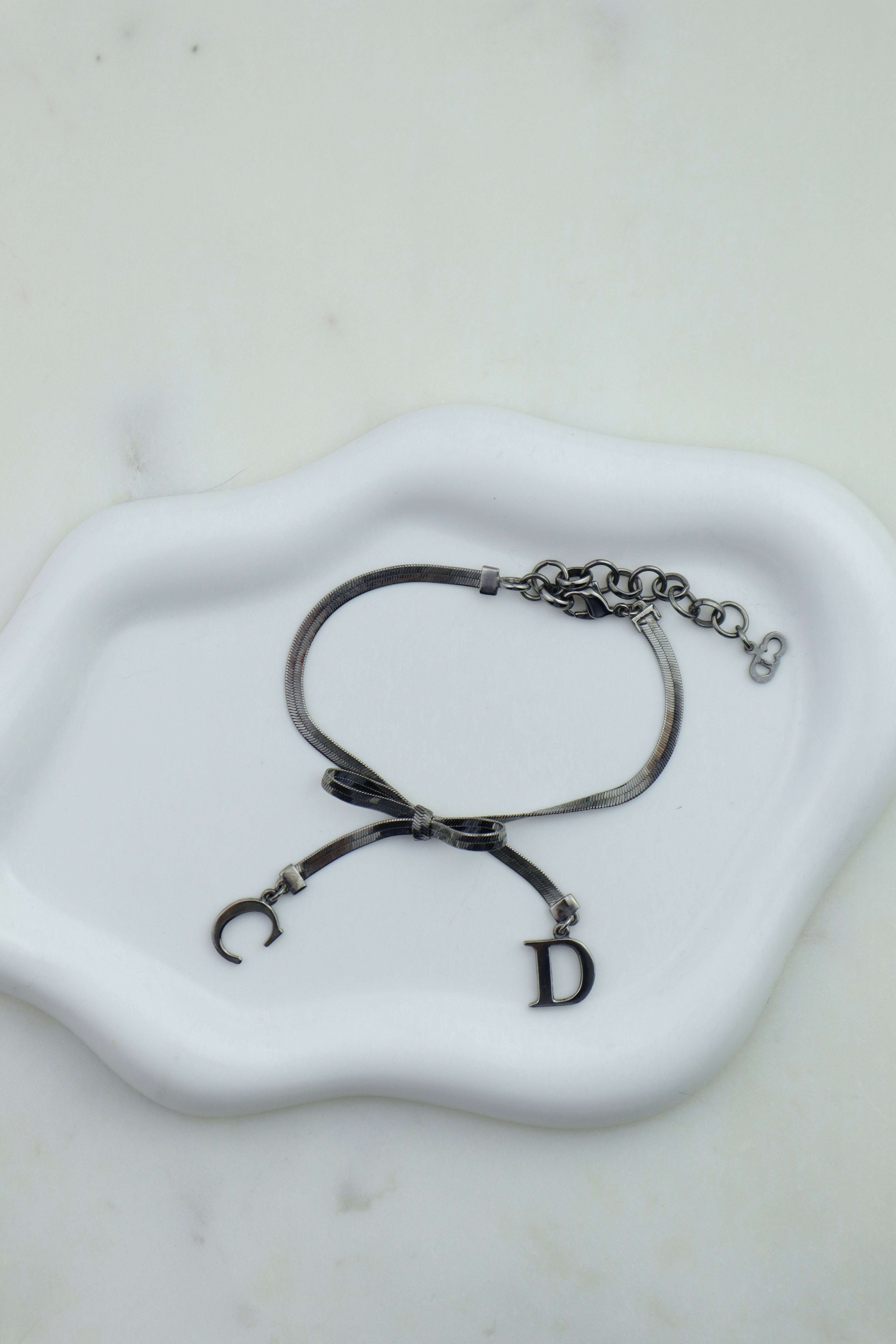 Christian Dior - bransoletka z logo CD