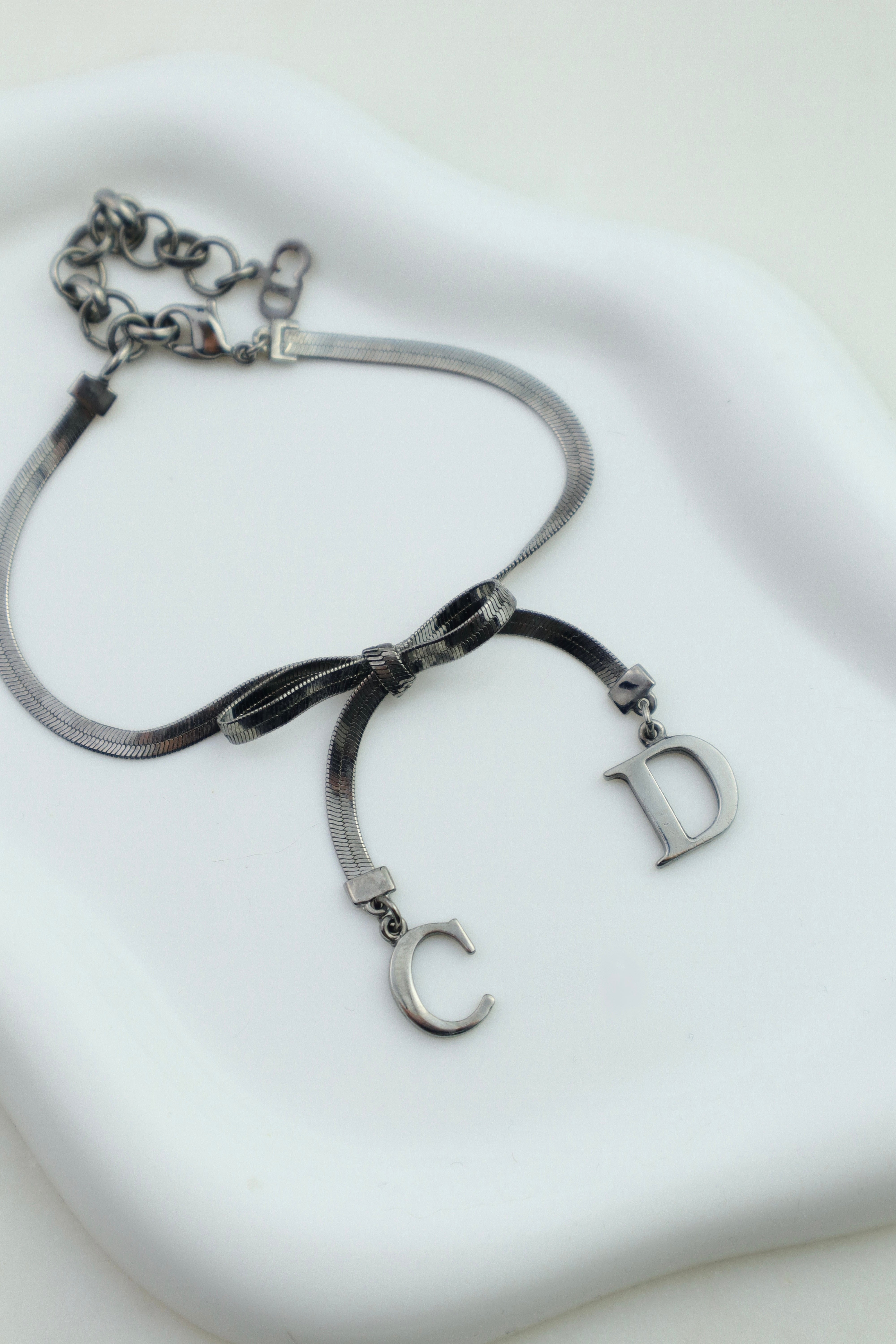 Christian Dior - bransoletka z logo CD