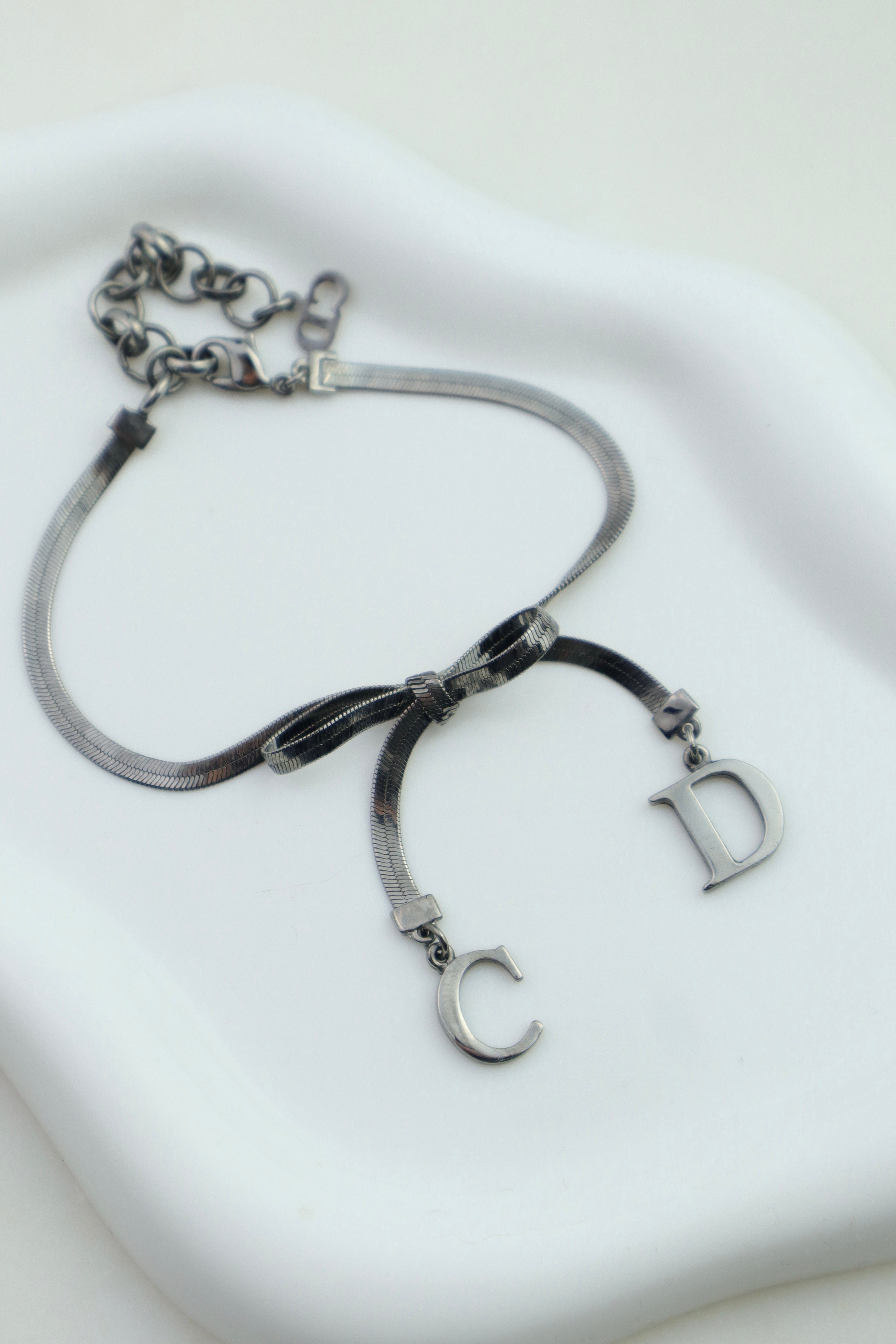 Christian Dior - bransoletka z logo CD