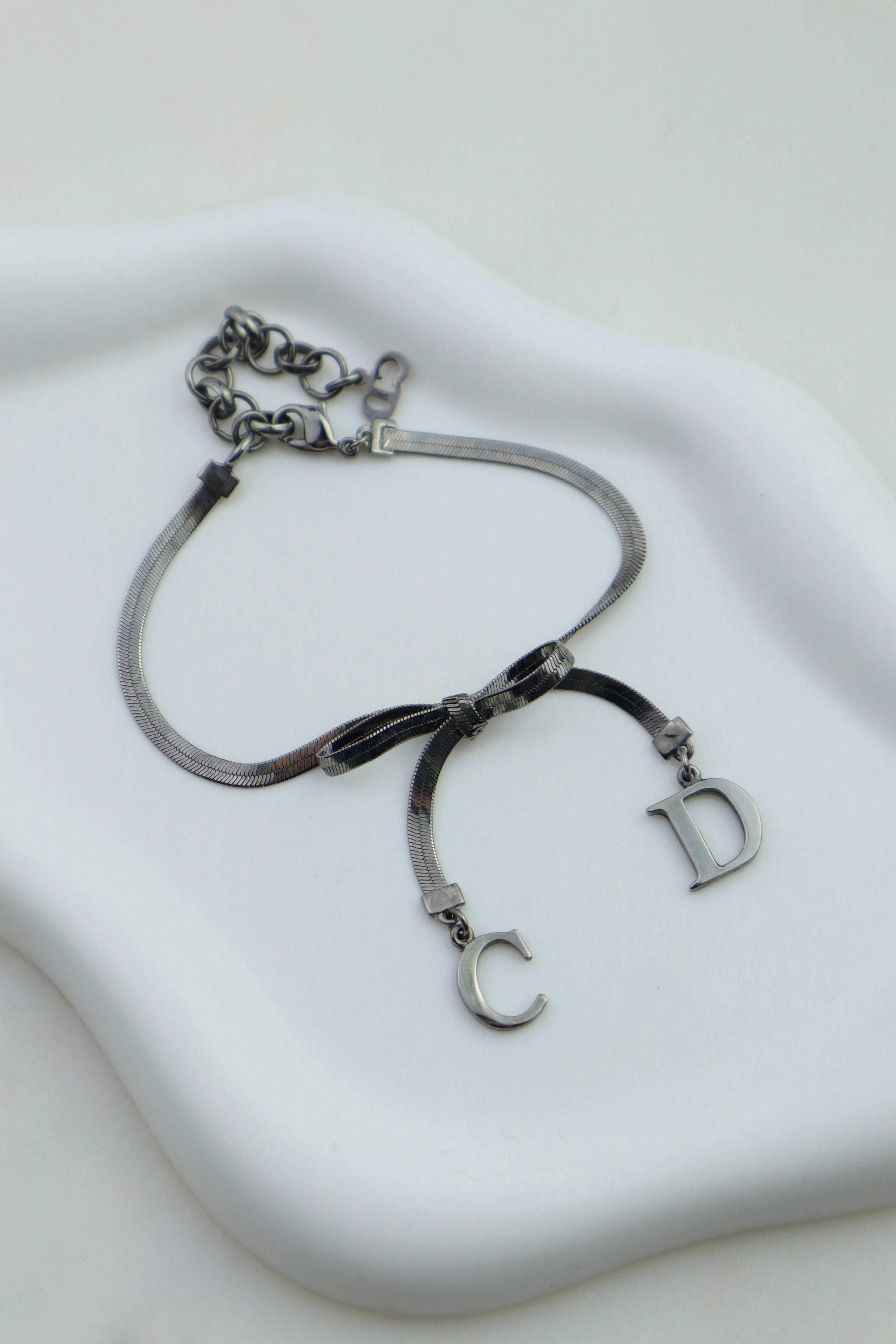 Christian Dior - bransoletka z logo CD