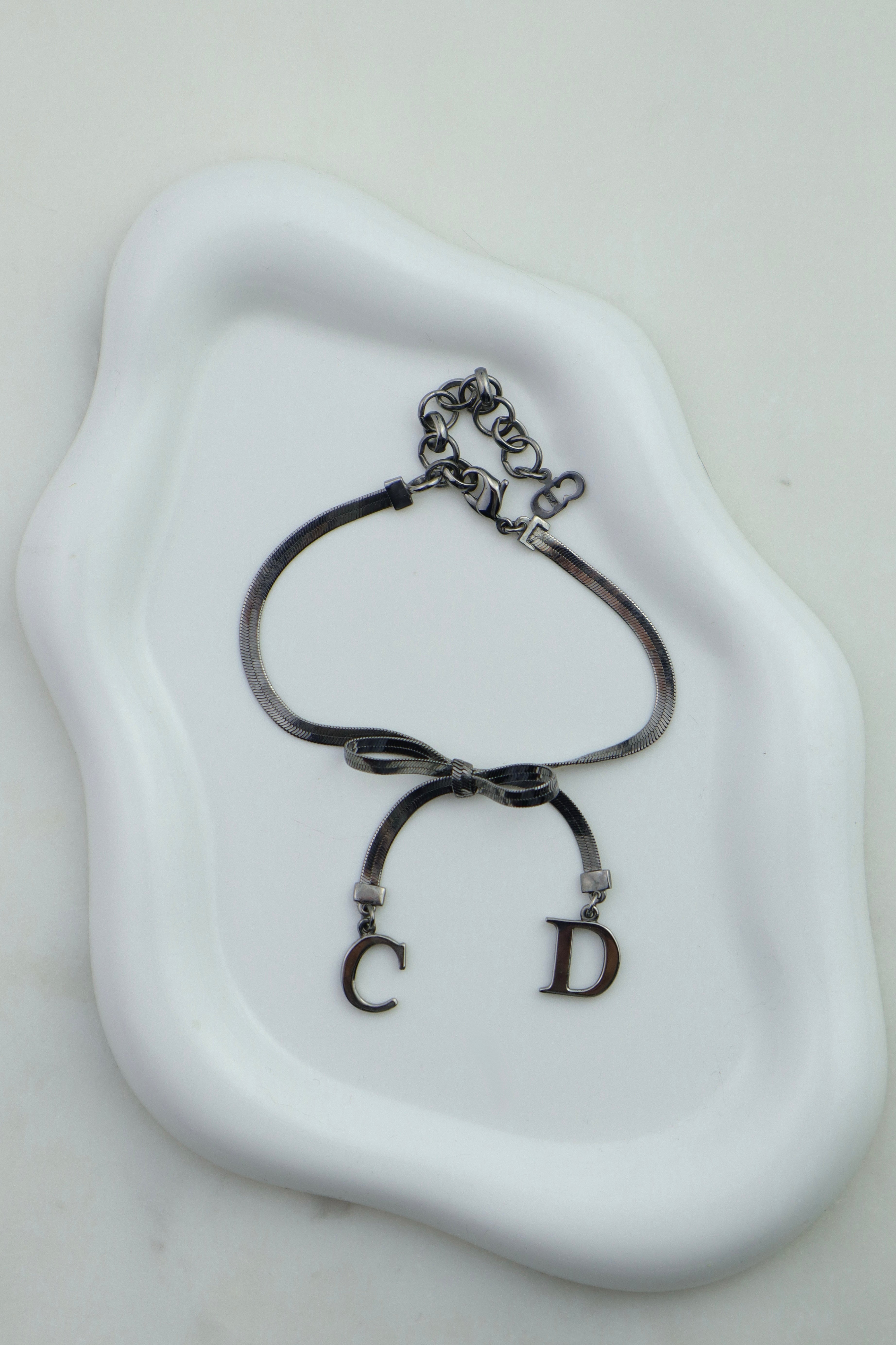 Christian Dior - bransoletka z logo CD