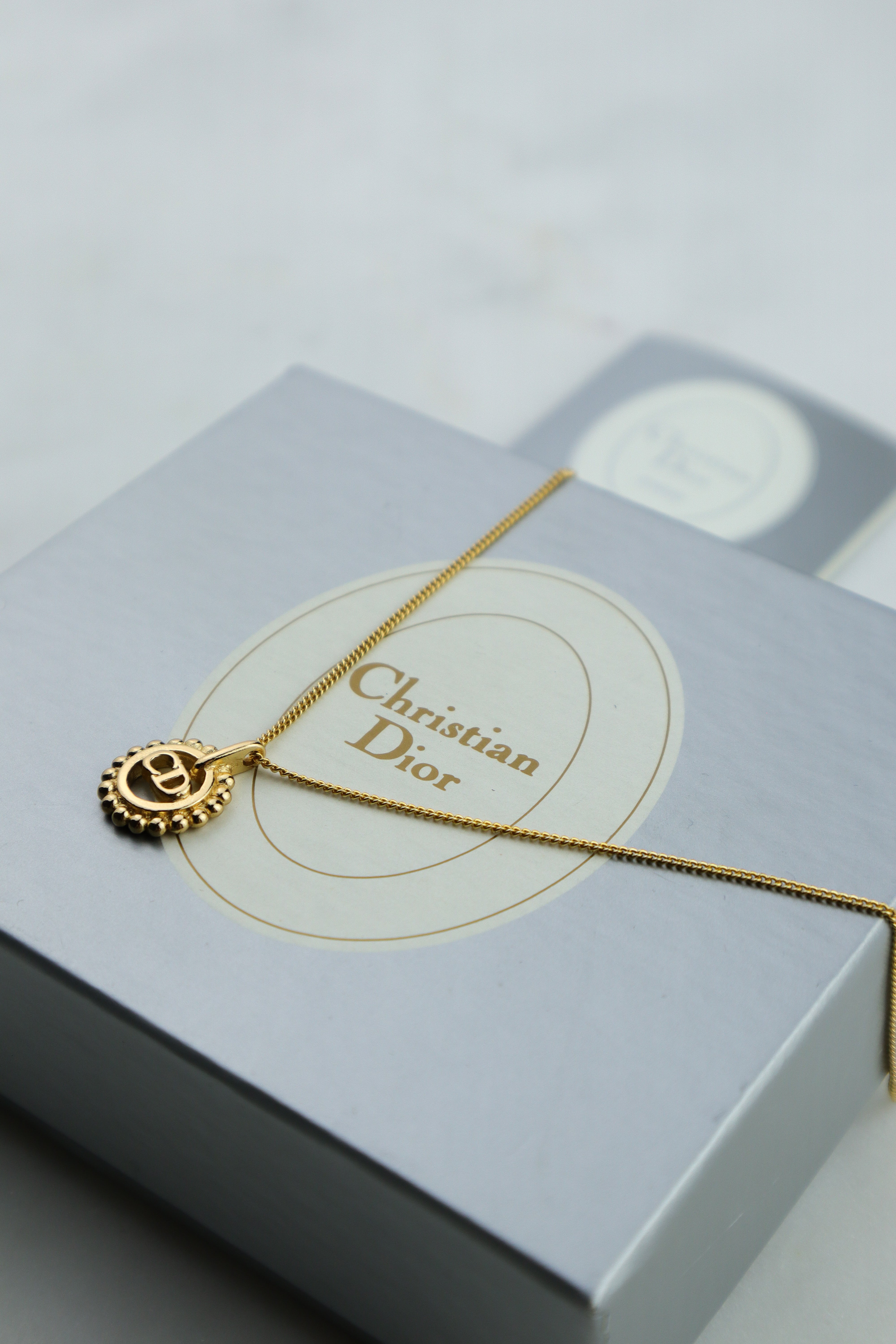 Christian Dior - vintage naszyjnik z zawieszką monogram CD