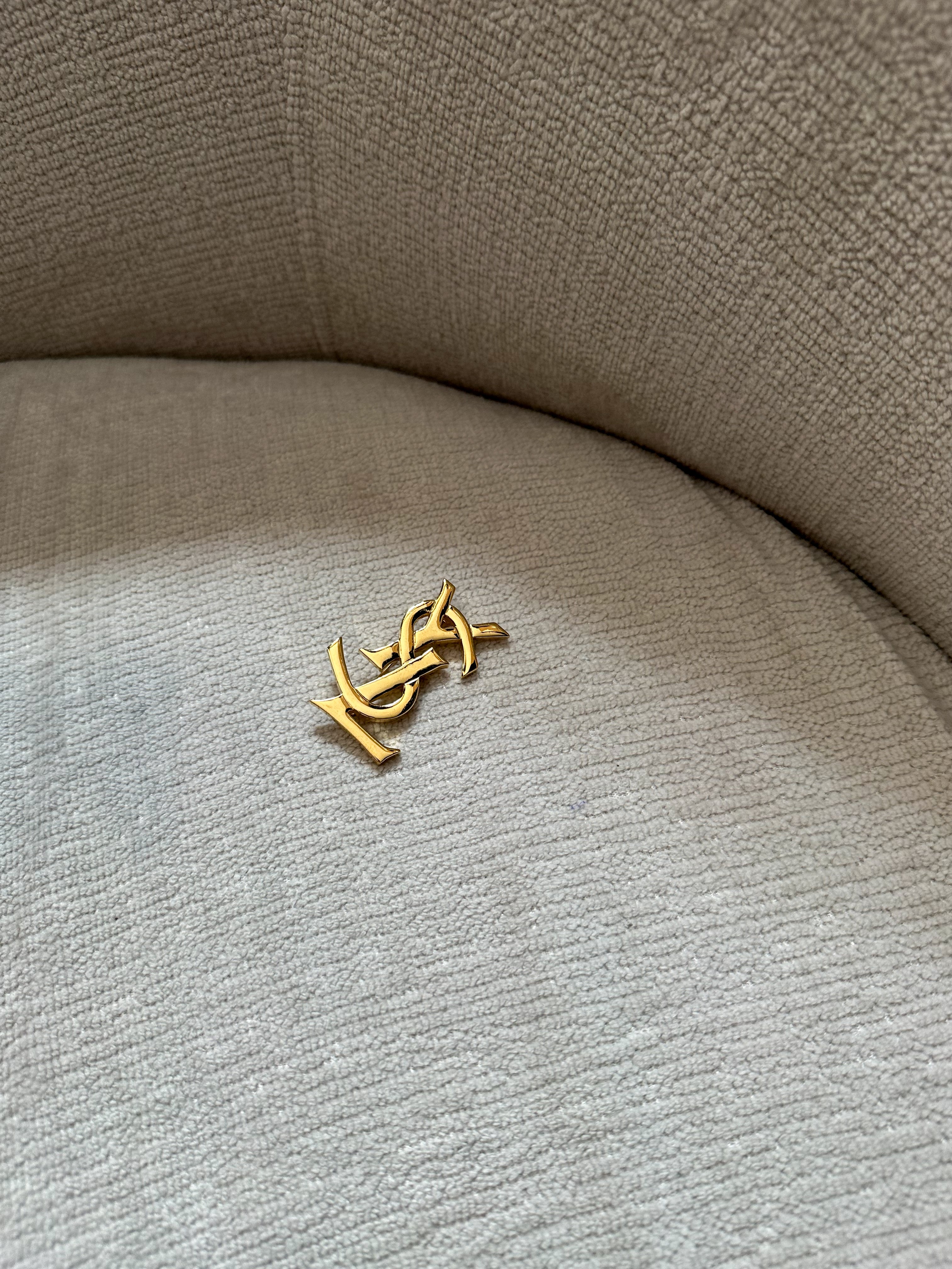 Yves Saint Laurent - broszka YSL