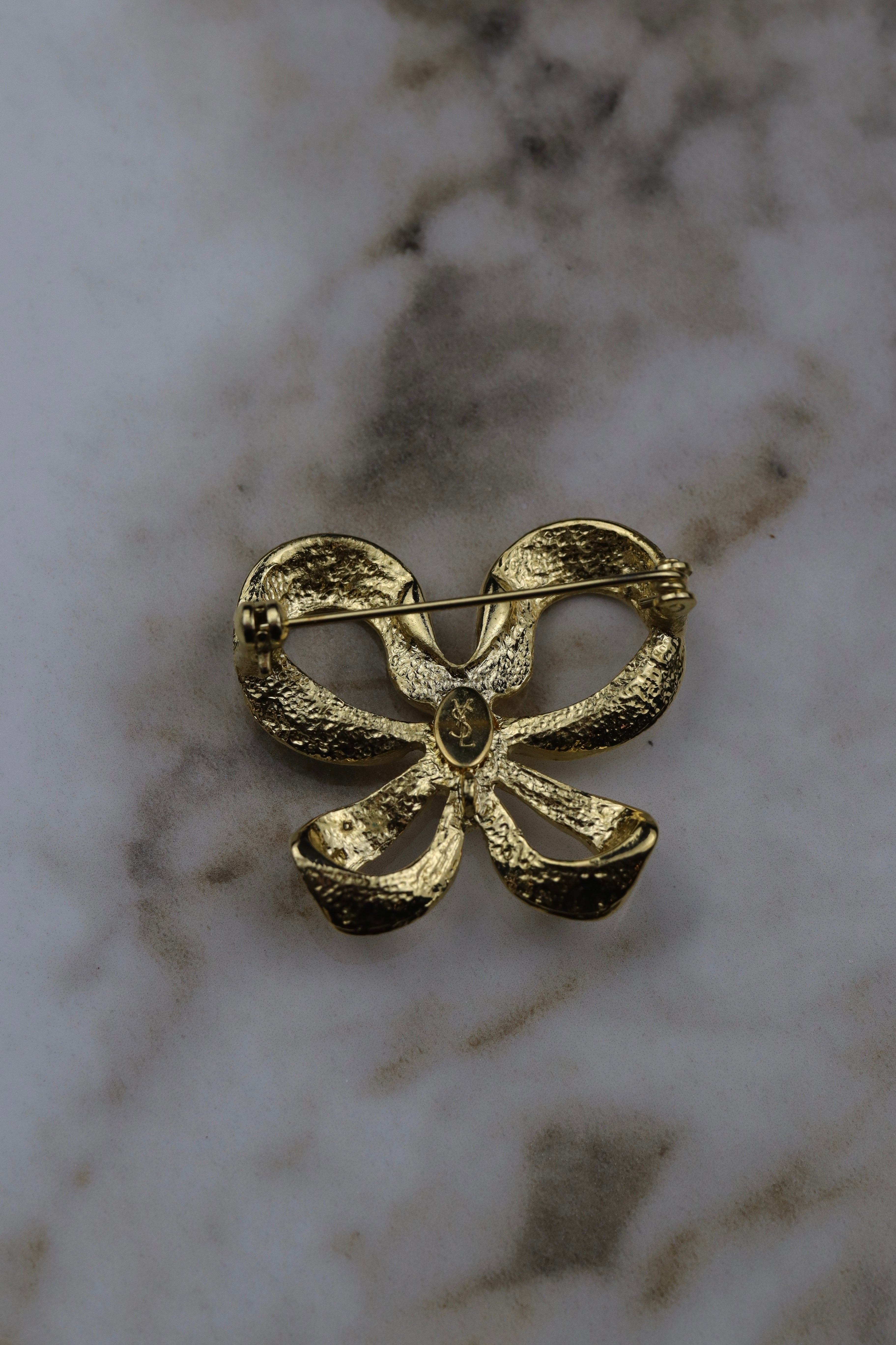 Yves Saint Laurent - broszka kokardka