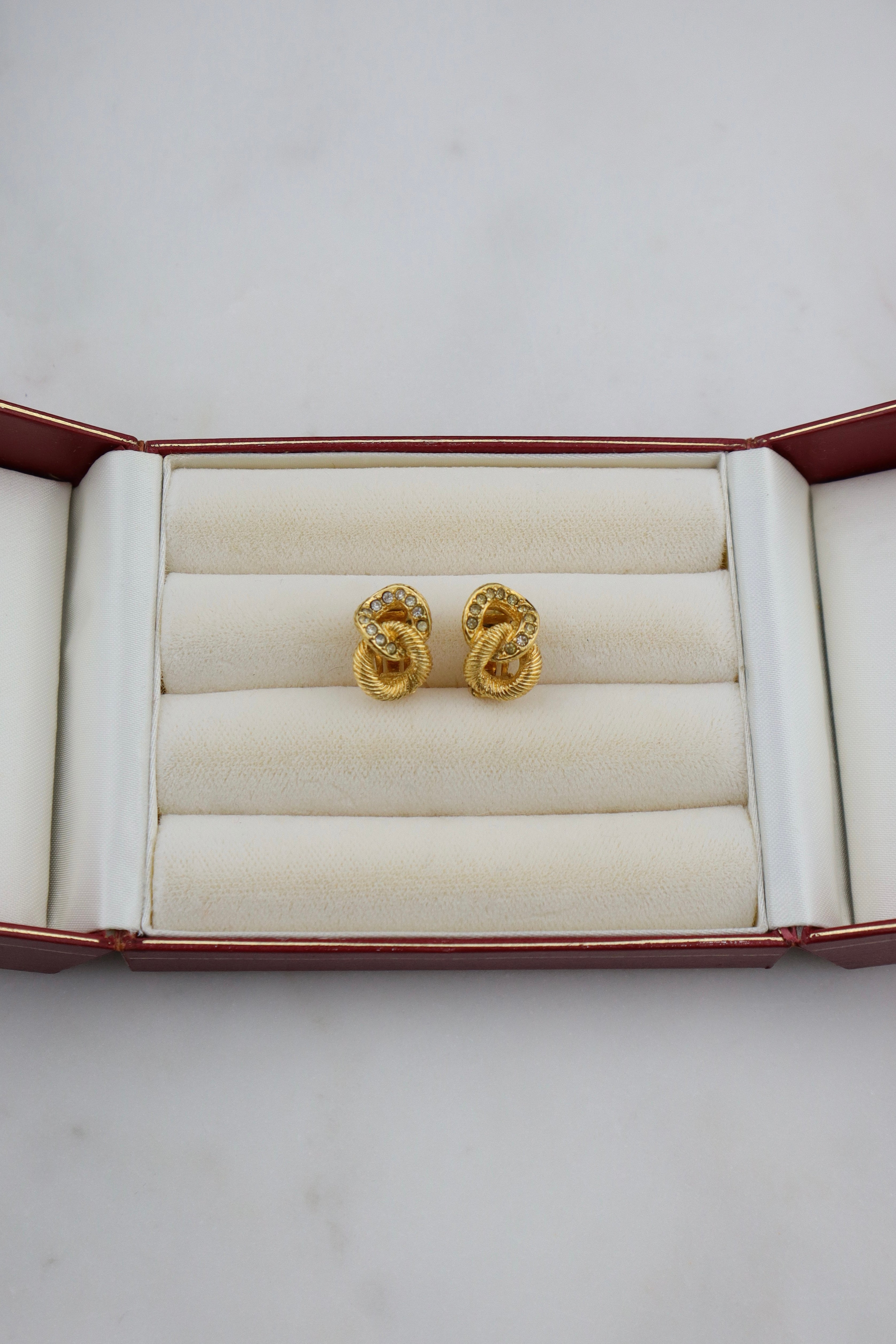 Christian Dior - pozłacane klipsy love knot