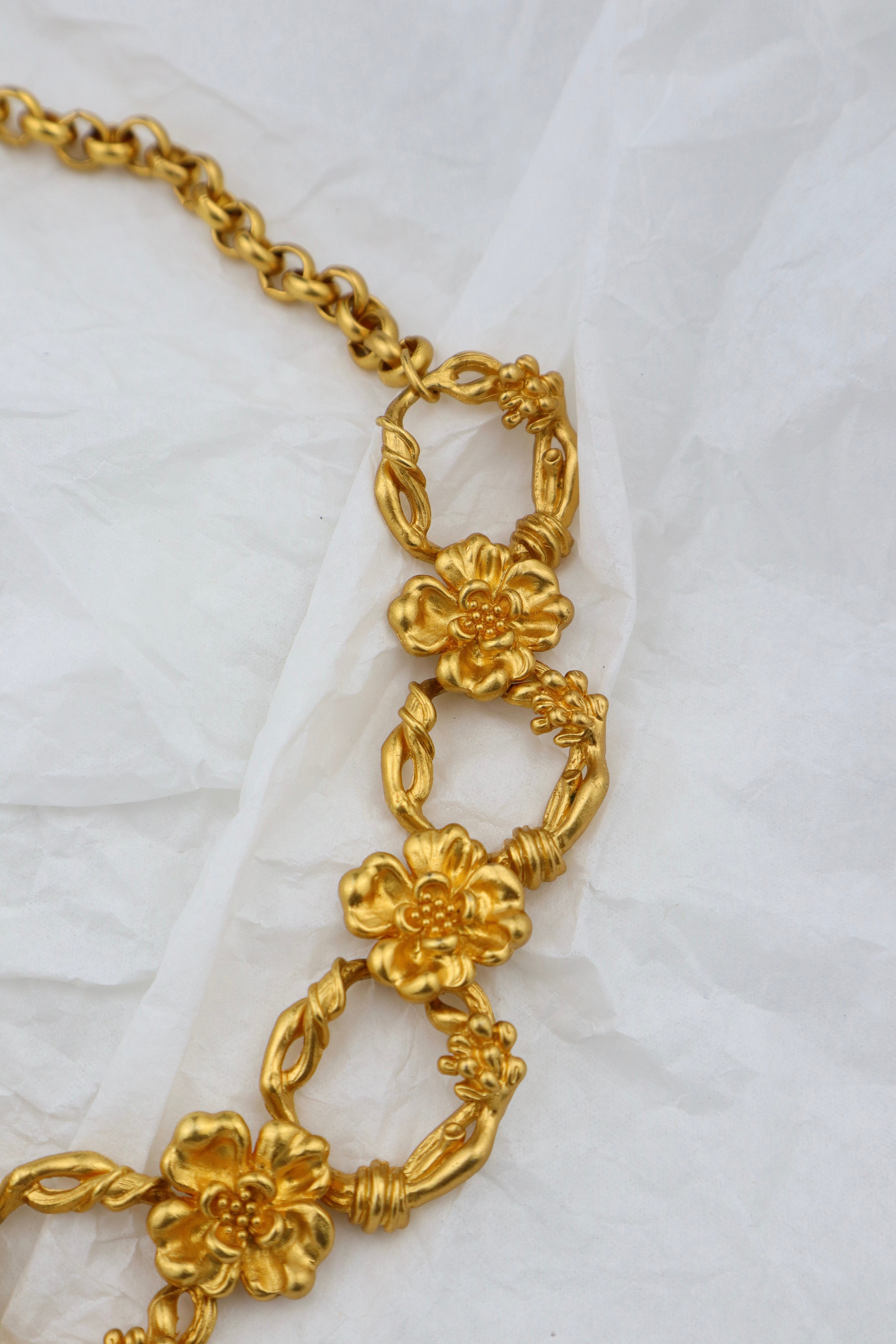 KENZO - złocona kolia z kwiecistych ogniw