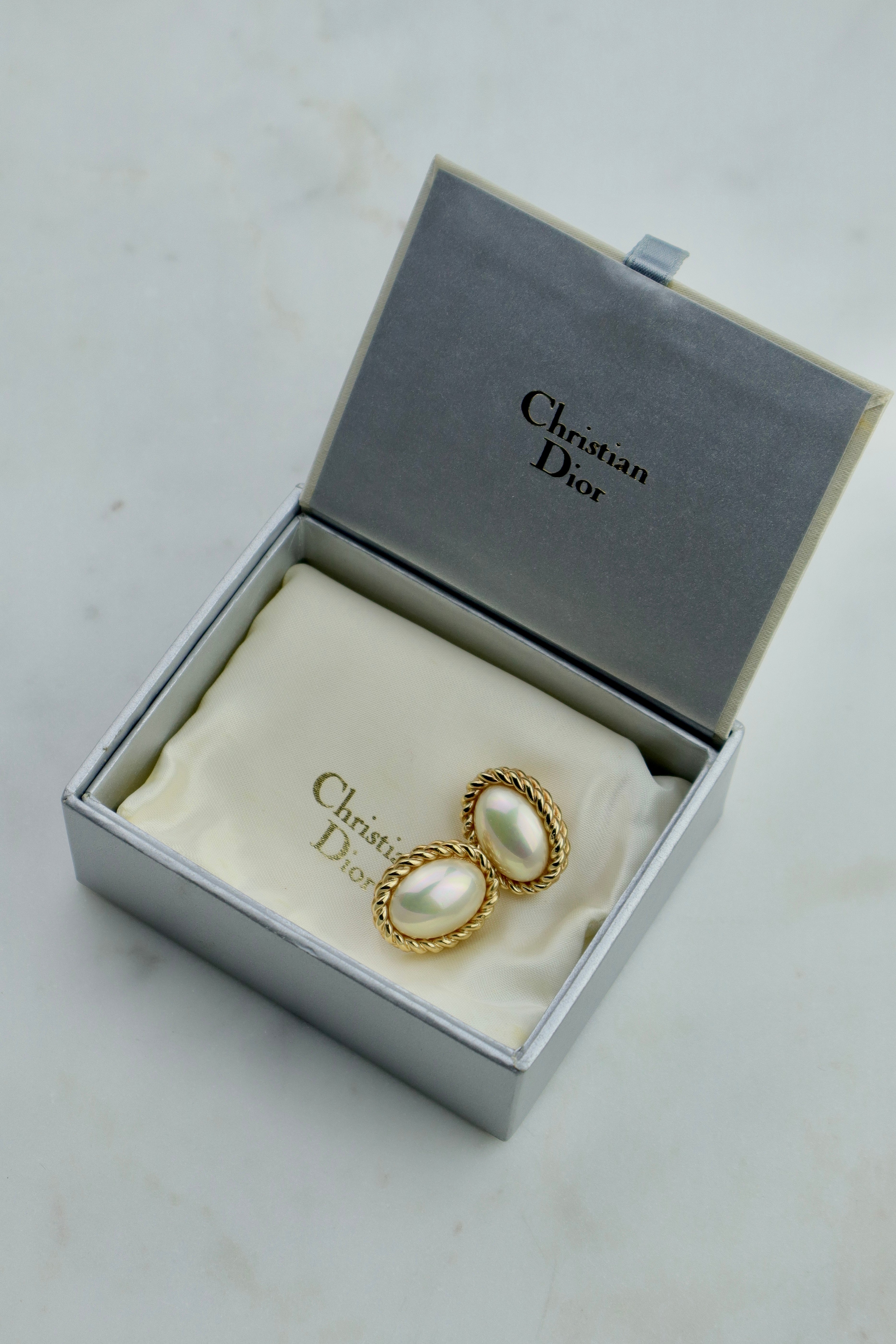 Christian Dior - owalne klipsy rope z perłą