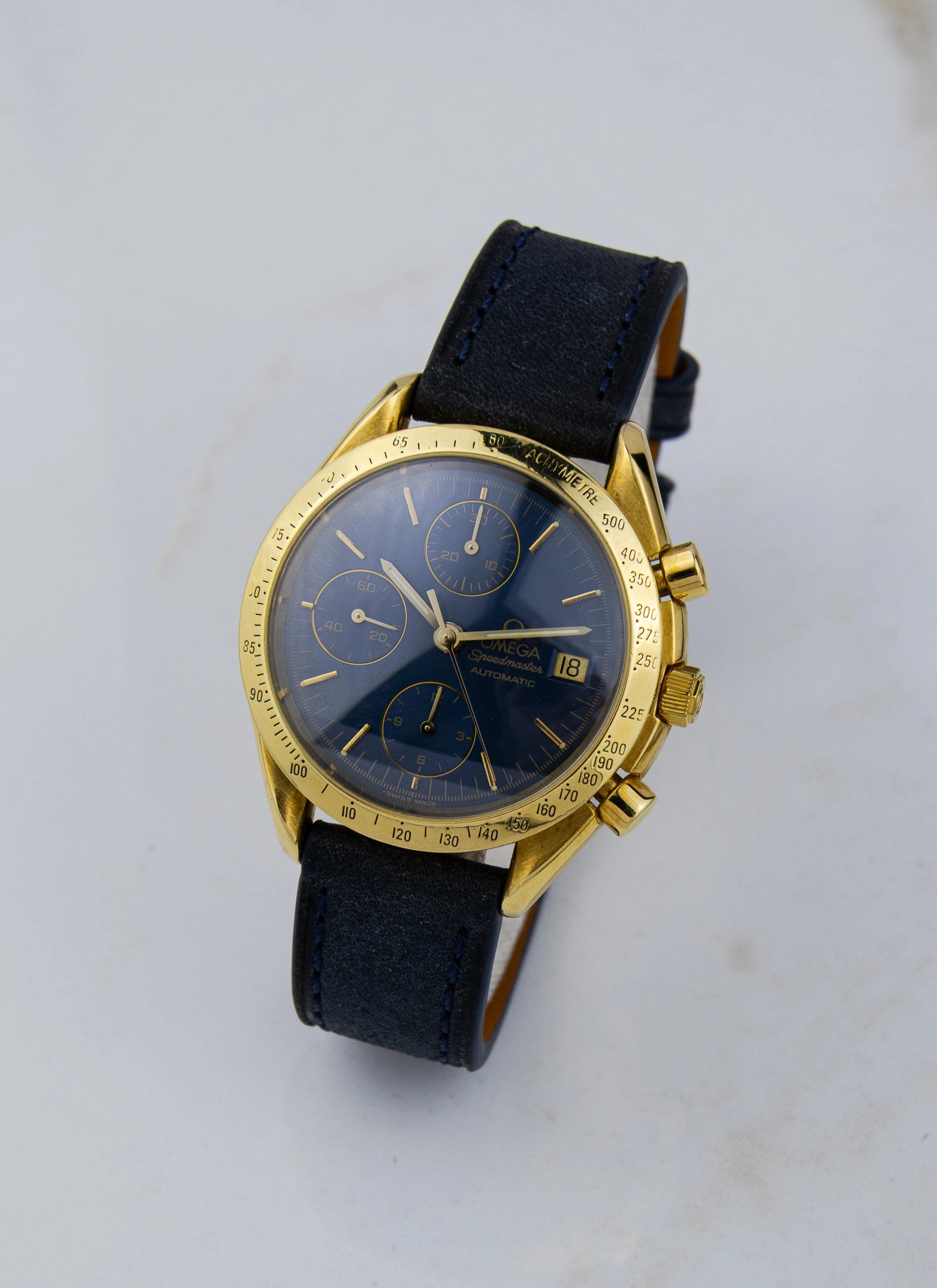 1990s 18K Omega Speedmaster Date Reduced Navy