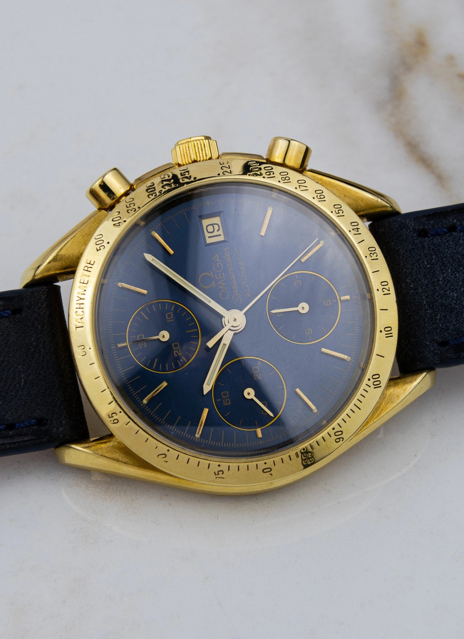1990s 18K Omega Speedmaster Date Reduced Navy