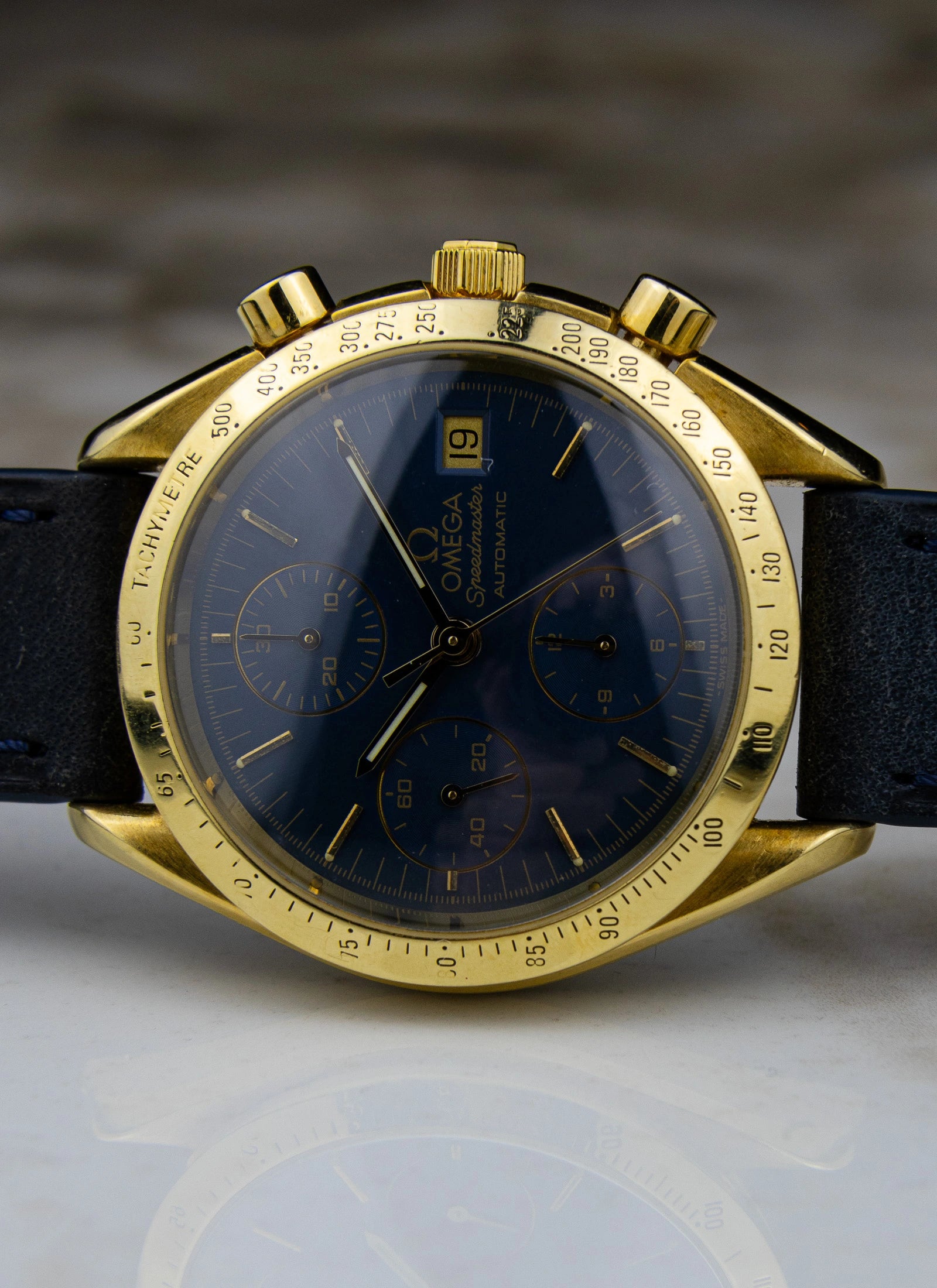 1990s 18K Omega Speedmaster Date Reduced Navy