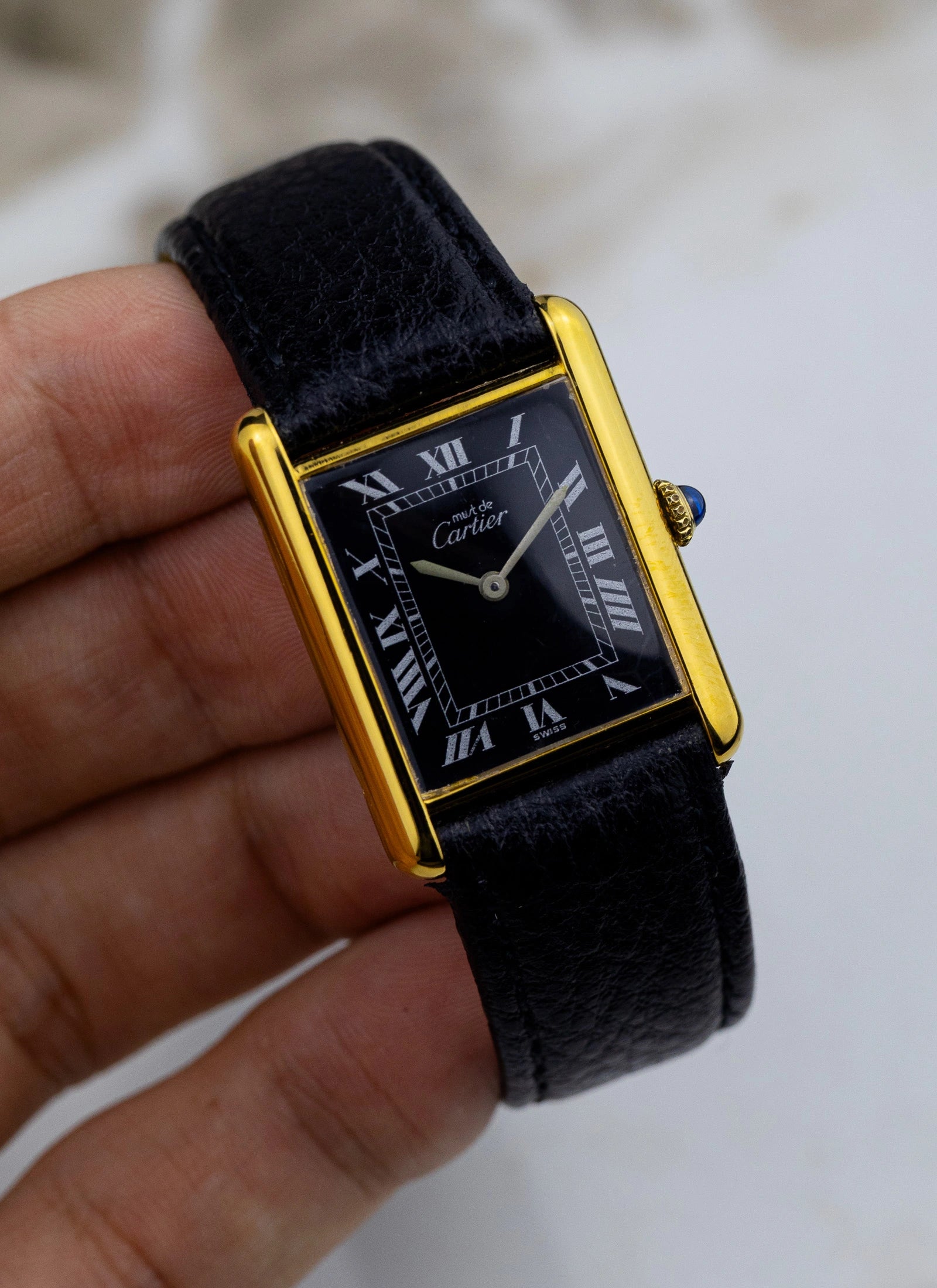 1980s Must De Cartier Tank Black Roman Dial Manual