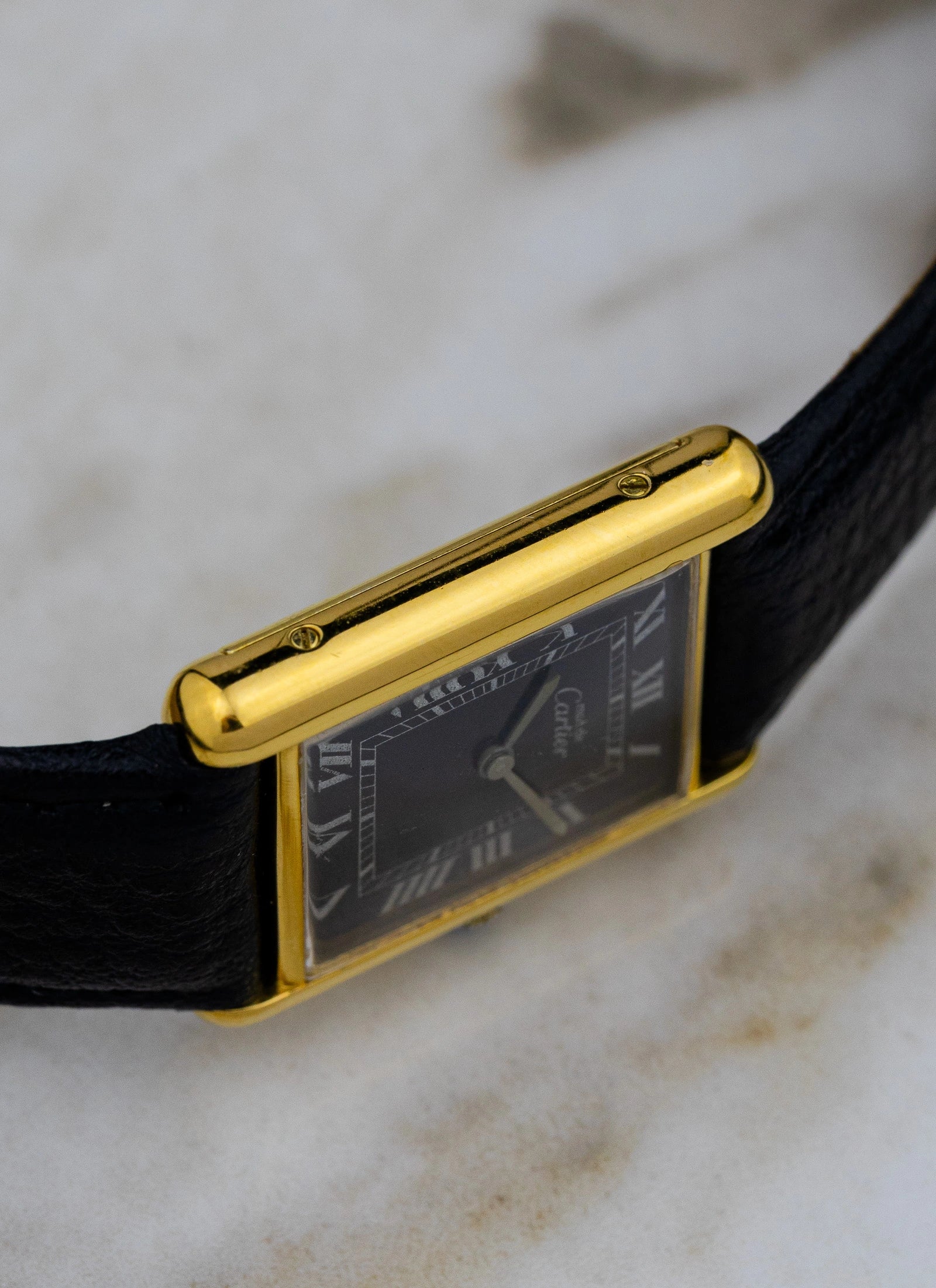 1980s Must De Cartier Tank Black Roman Dial Manual