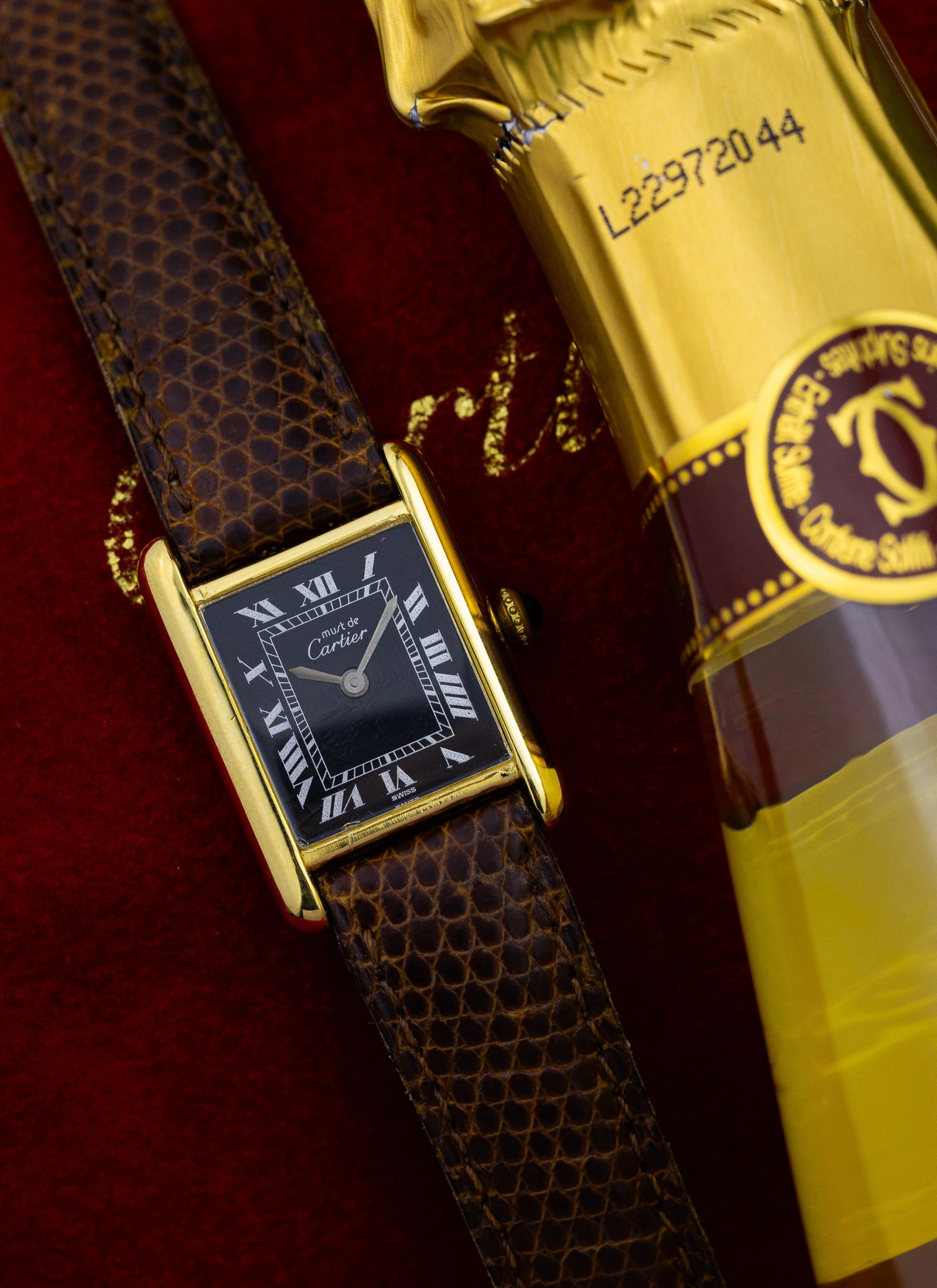 1980s Cartier Tank Vermeil Black Roman Dial