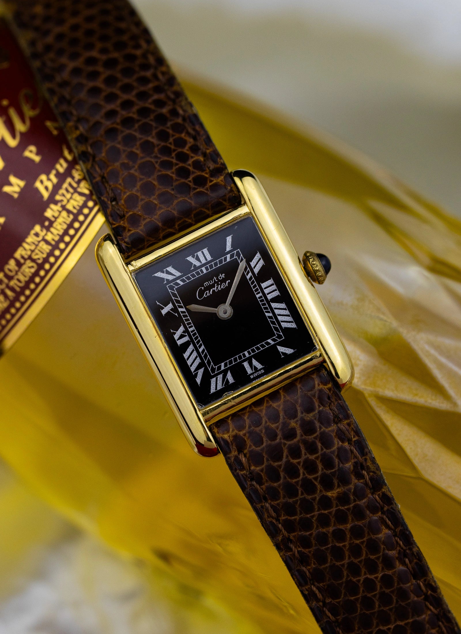 1980s Cartier Tank Vermeil Black Roman Dial