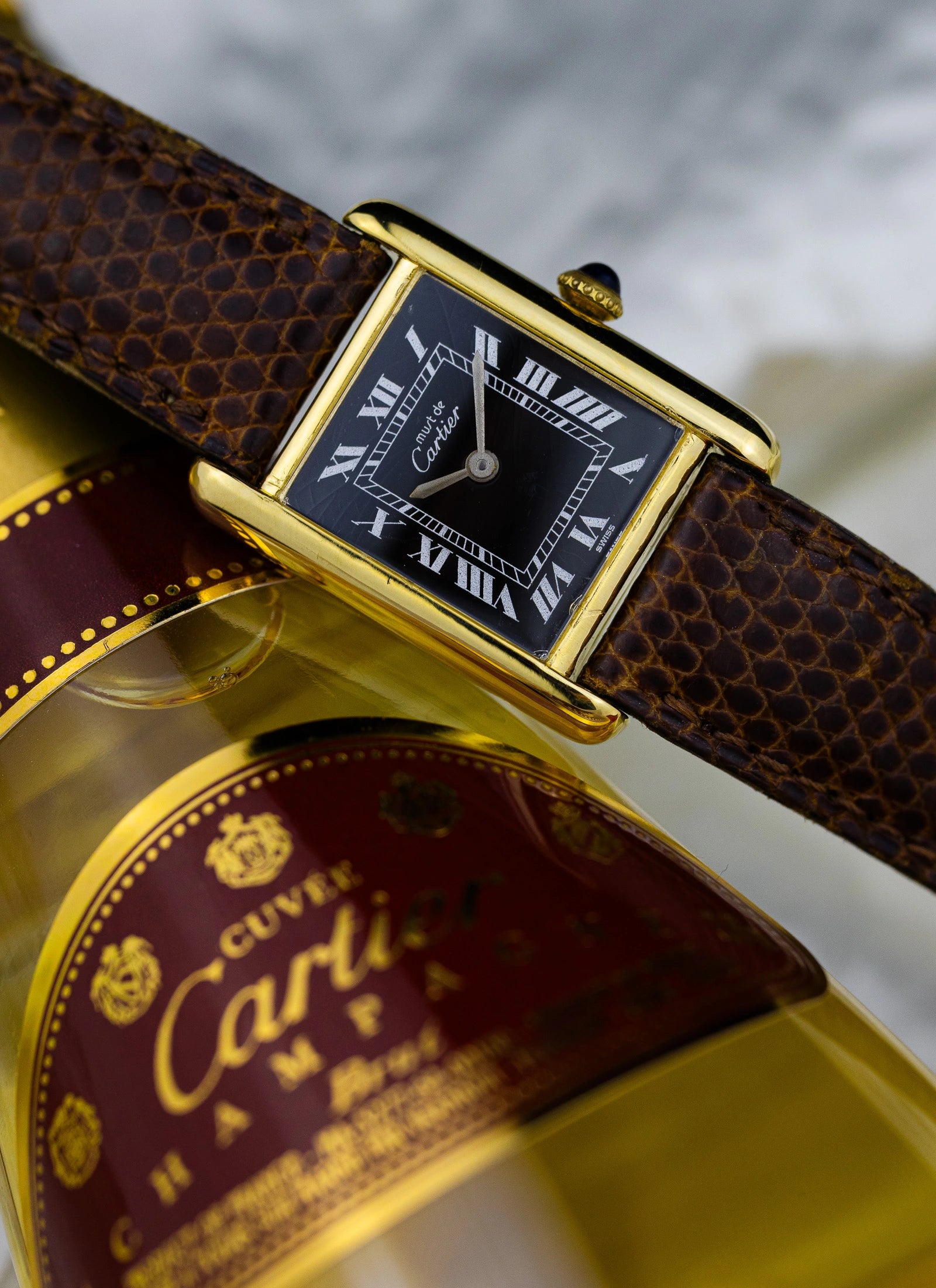 1980s Cartier Tank Vermeil Black Roman Dial