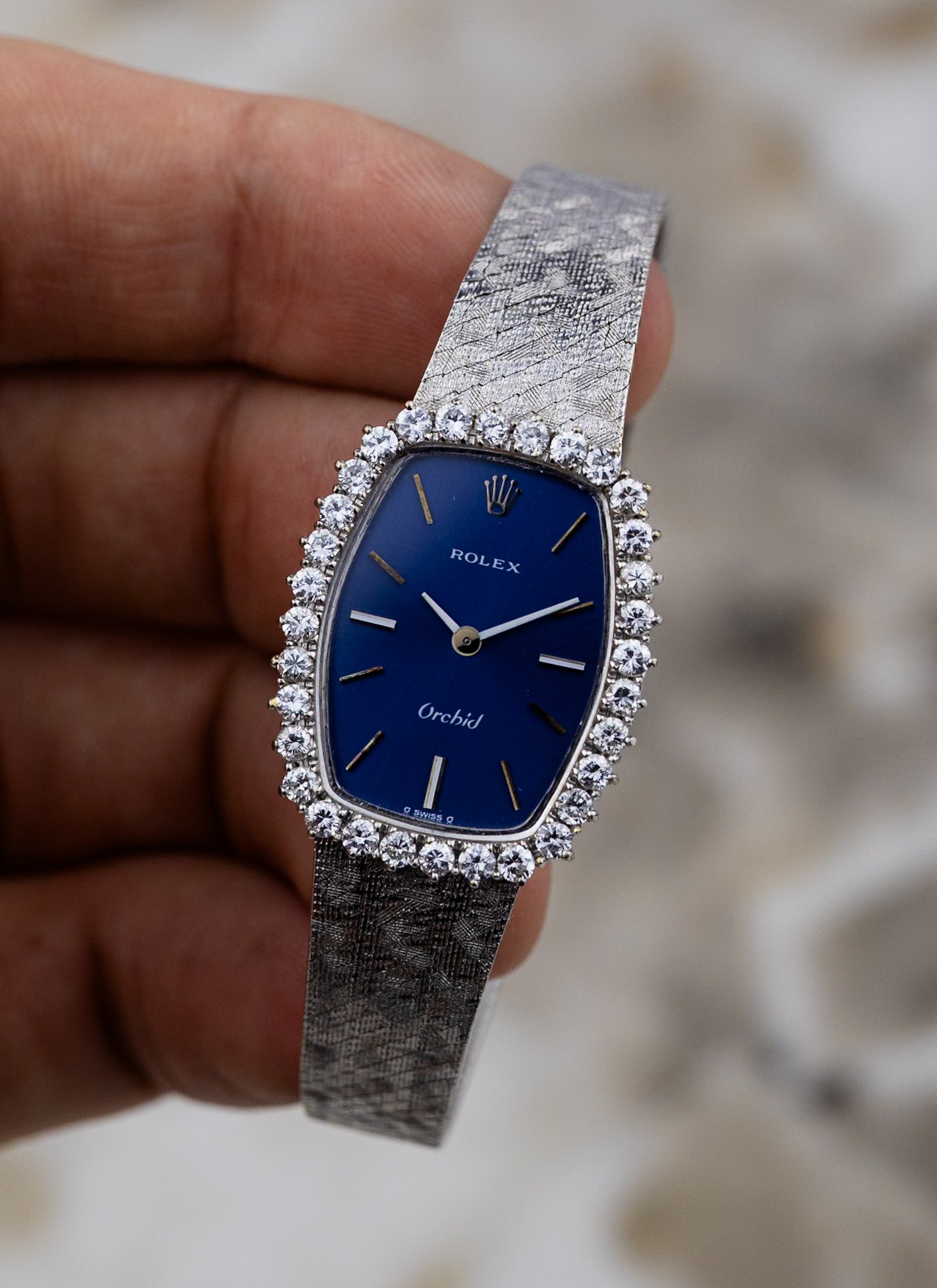 1975 18K Lady Rolex Orchid Navy Dial Diamond Bezel 2676