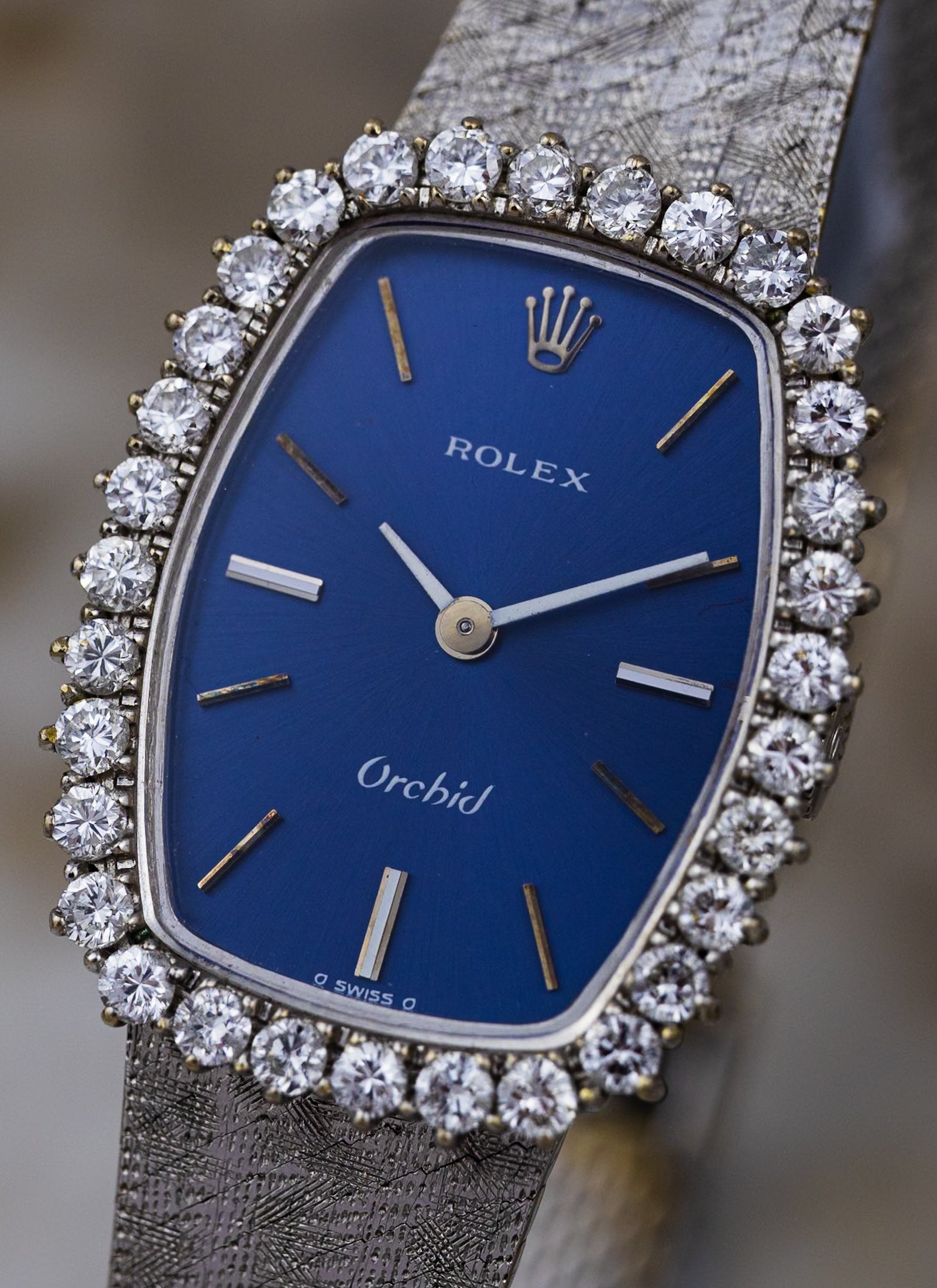1975 18K Lady Rolex Orchid Navy Dial Diamond Bezel 2676