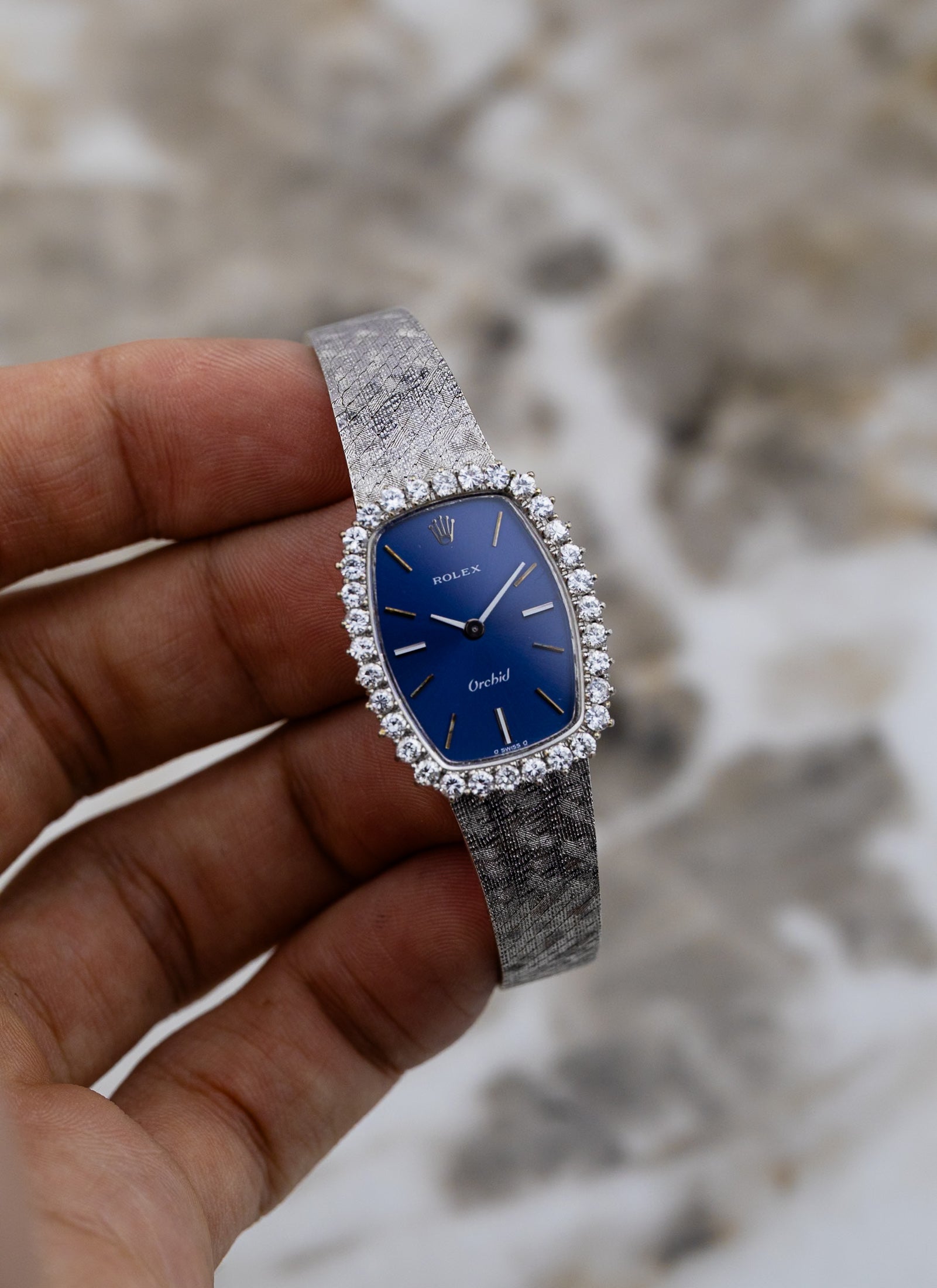1975 18K Lady Rolex Orchid Navy Dial Diamond Bezel 2676