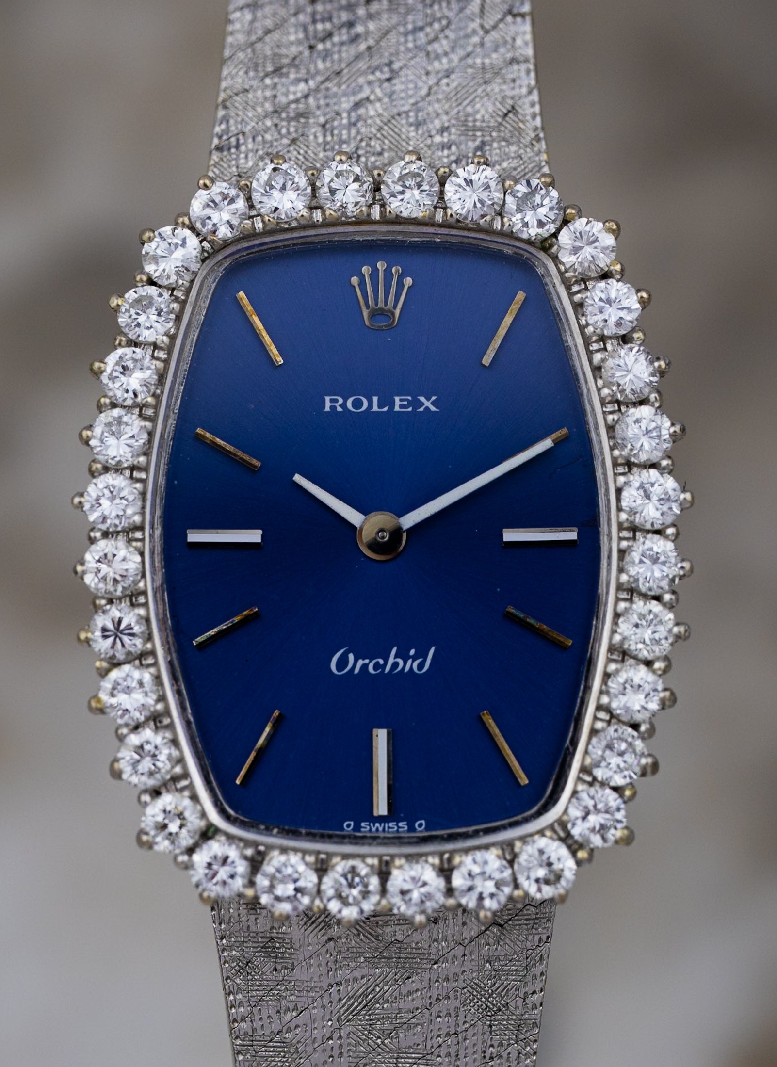 1975 18K Lady Rolex Orchid Navy Dial Diamond Bezel 2676