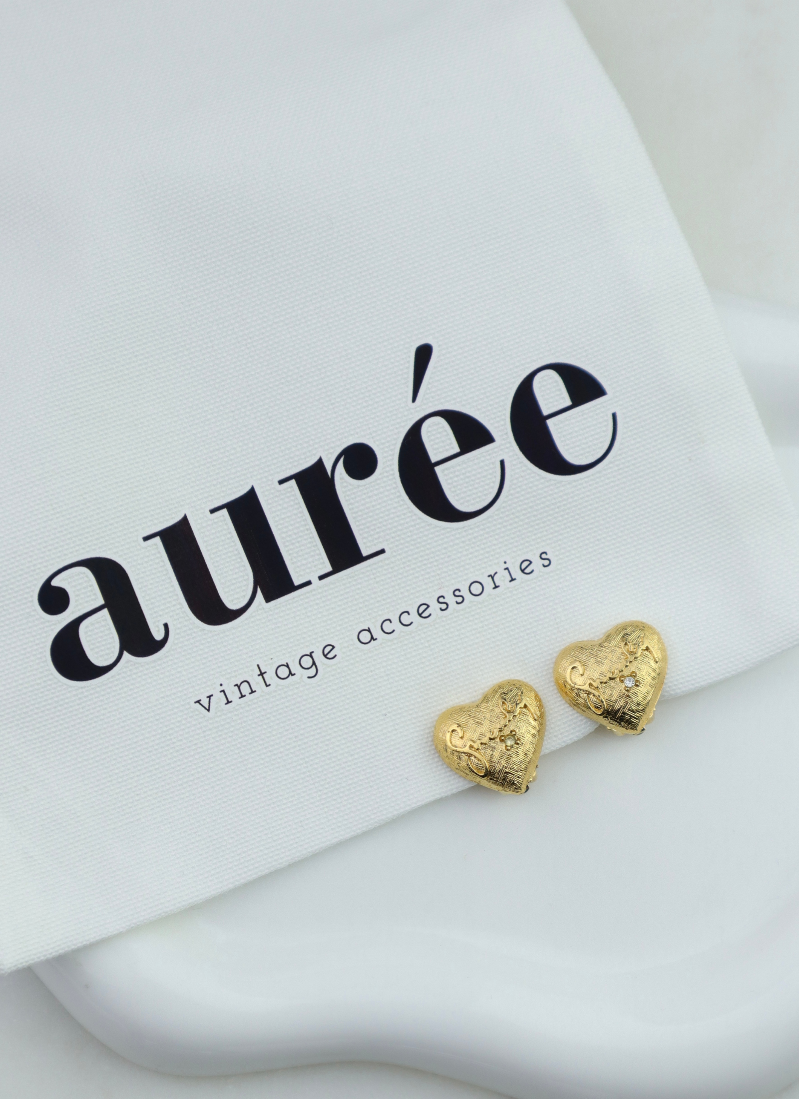 Givenchy - pozłacane klipsy serce