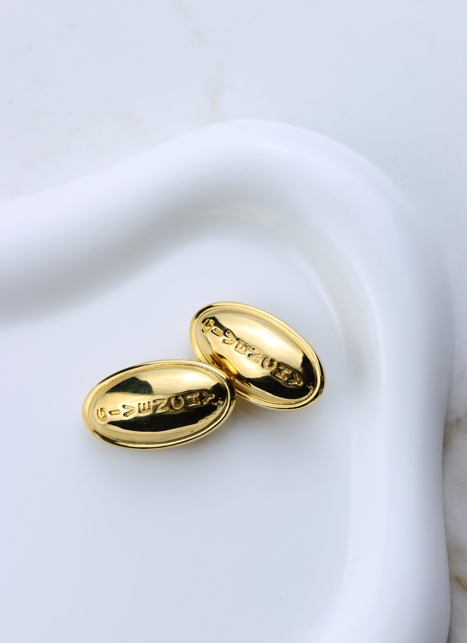 Givenchy - owalne polerowne klipsy vintage