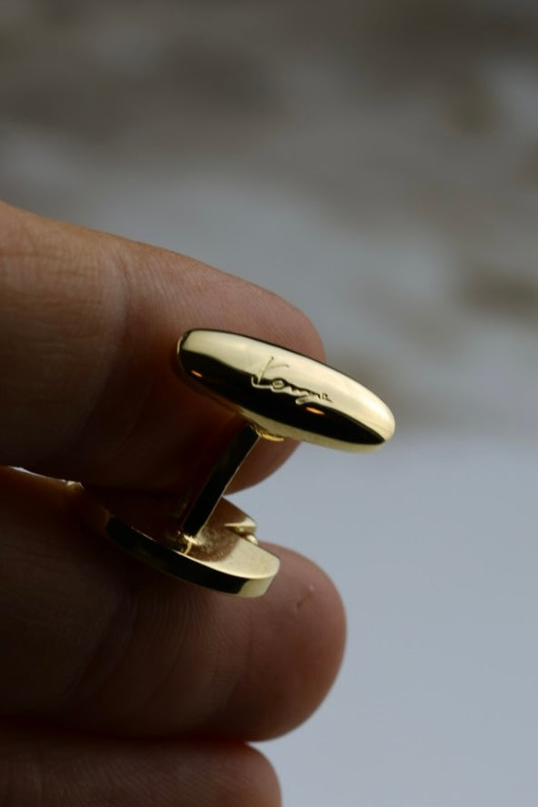 Kenzo – spinki do mankietów i spinka do krawatu, złoty odcień i czarnym logo (S34)