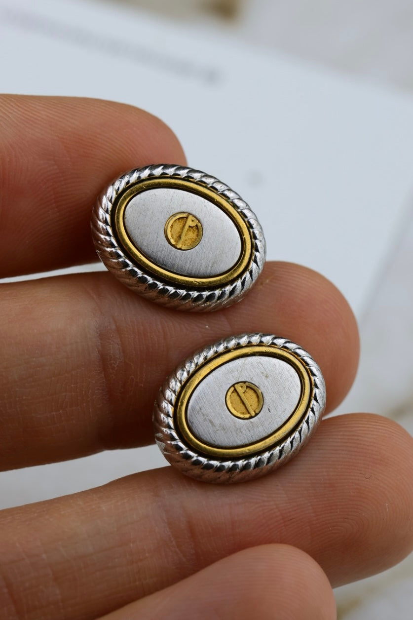 Dunhill – stalowo-złocone owalne spinki z logo (SP007)