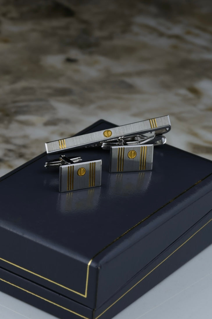 Dunhill – spinki do mankietów i spinka do krawatu, stal szczotkowana ze złotymi akcentami (S39)