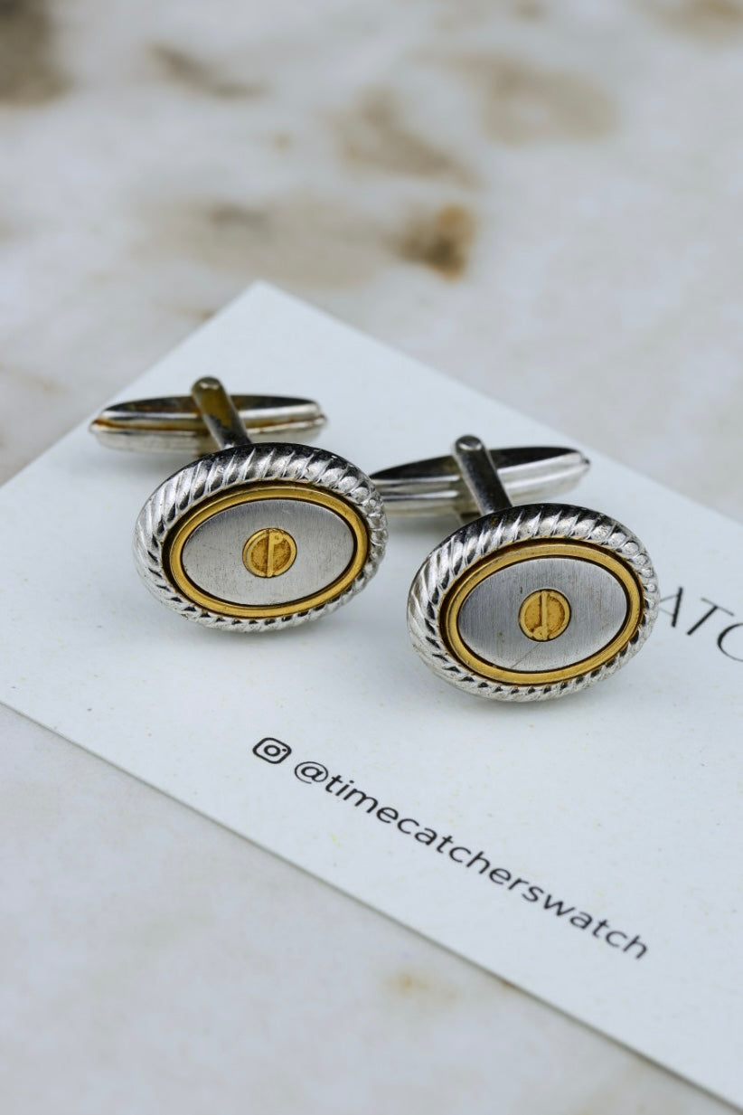 Dunhill – stalowo-złocone owalne spinki z logo (SP007)