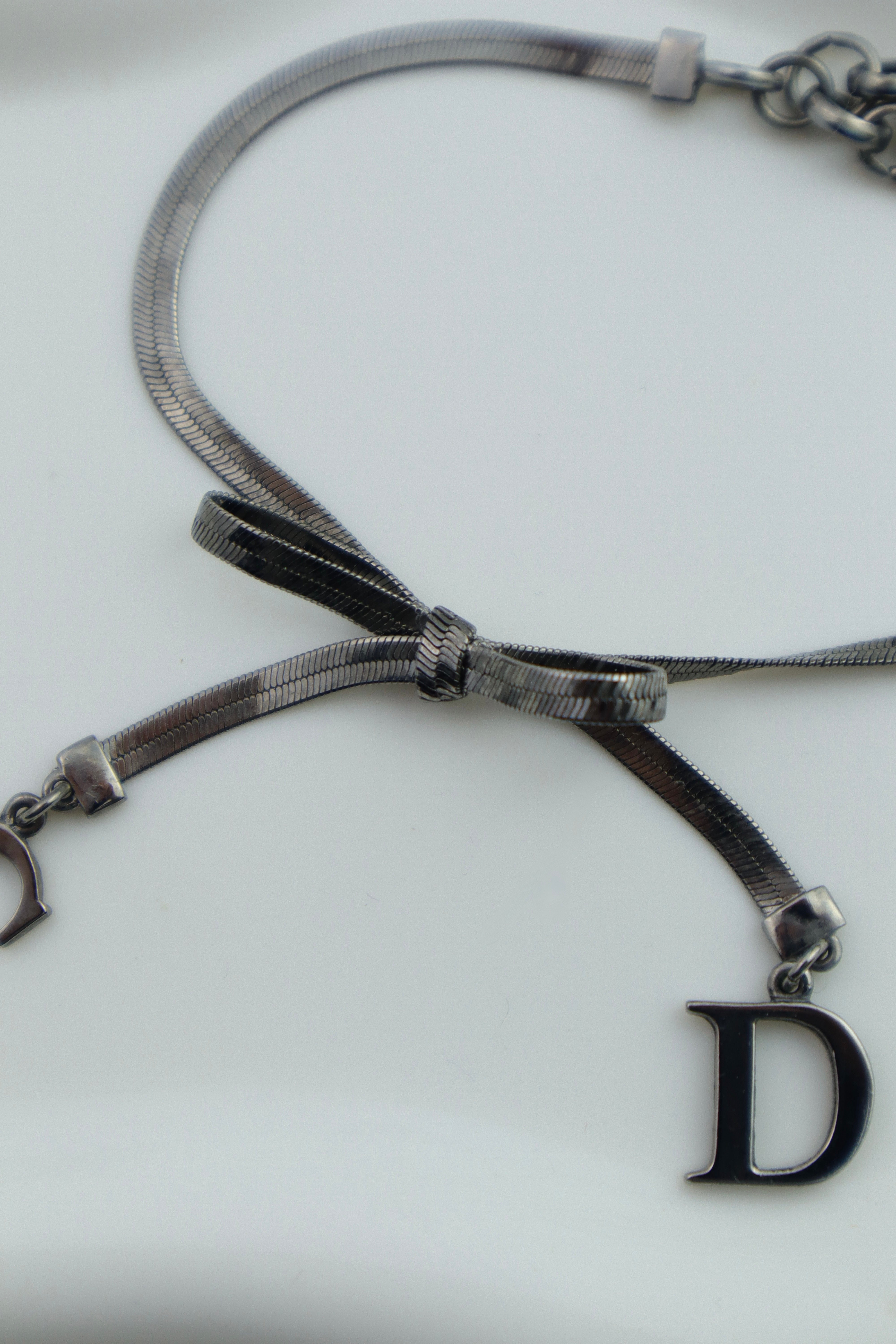 Christian Dior - bransoletka z logo CD