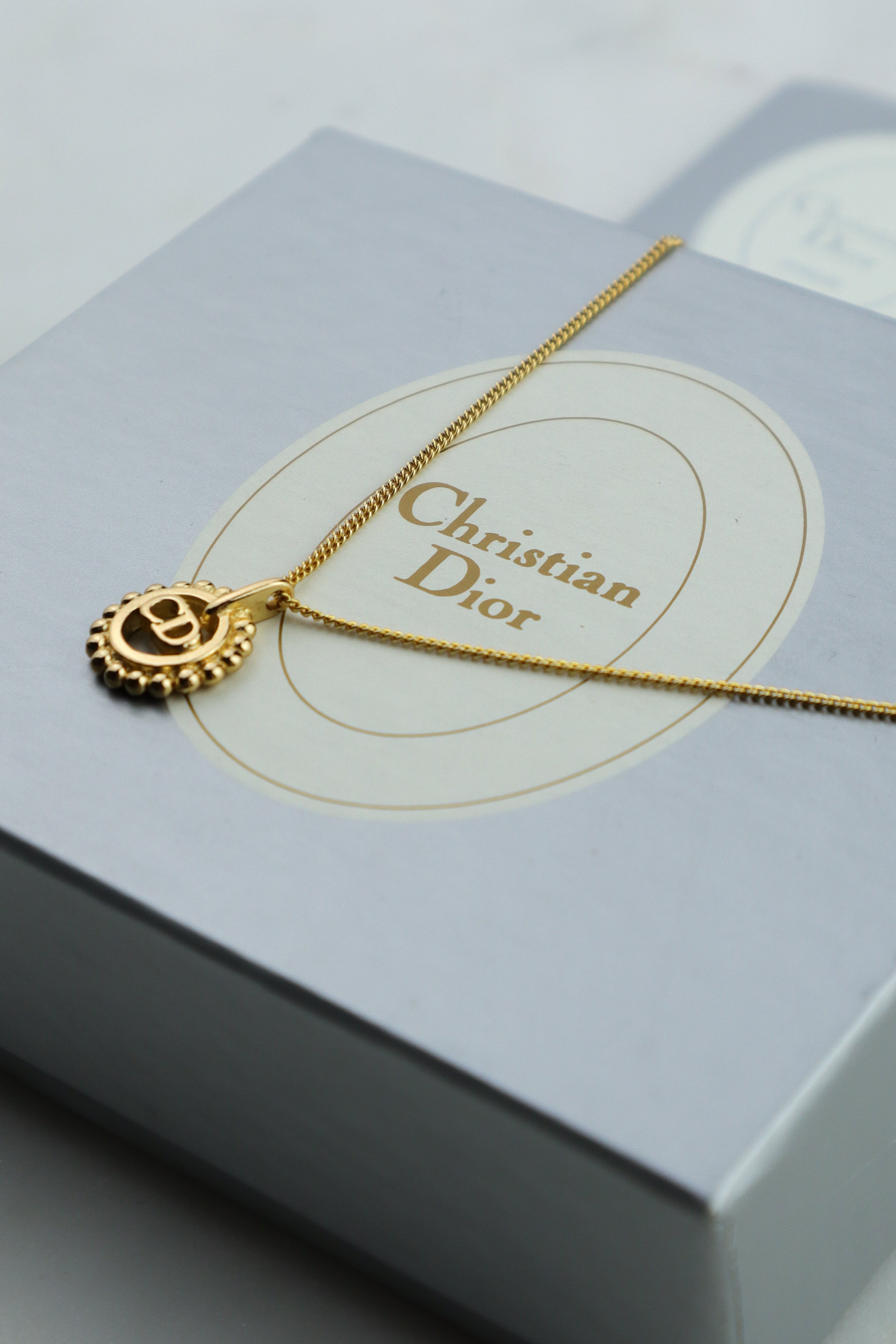 Christian Dior - vintage naszyjnik z zawieszką monogram CD