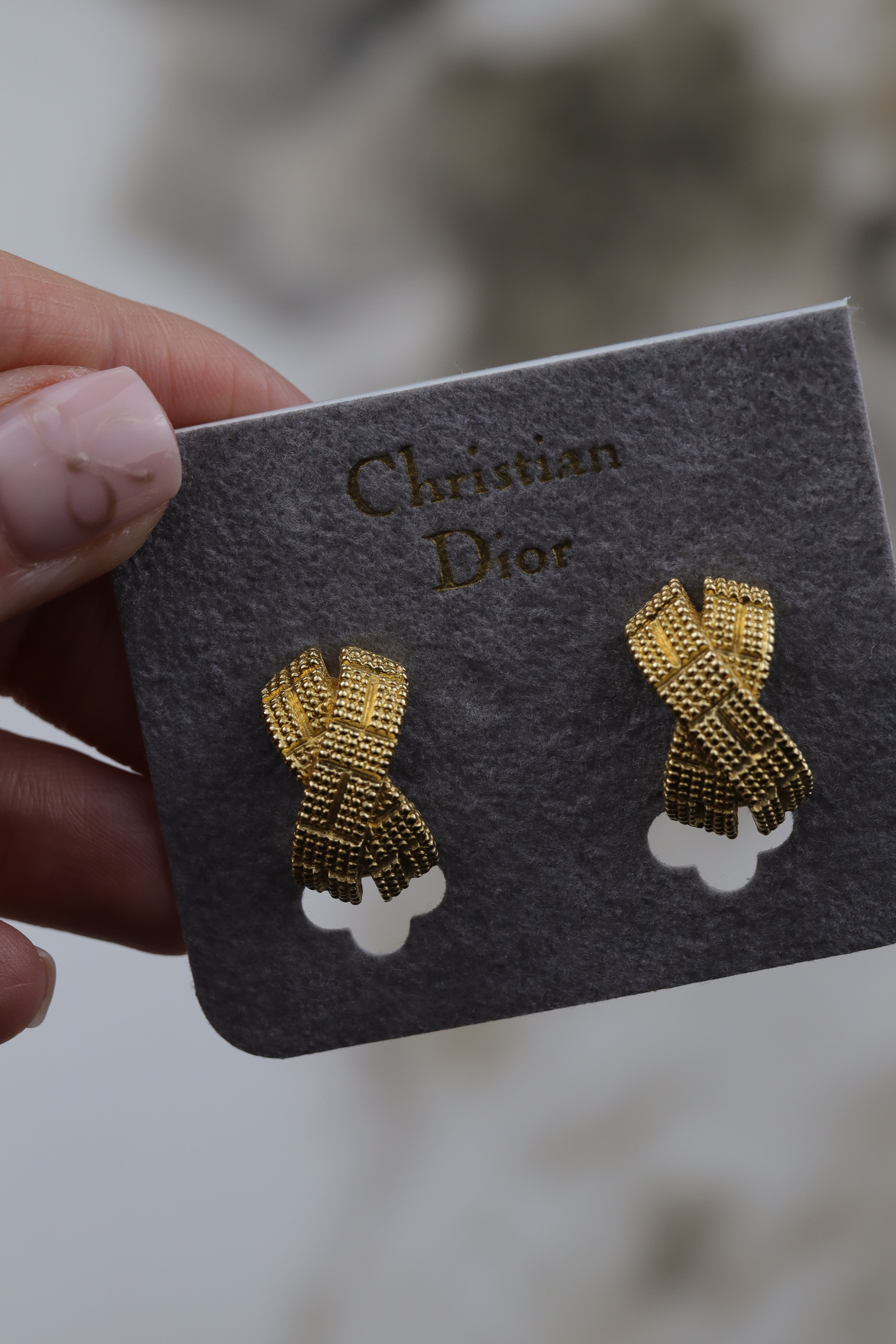Christian Dior - pozłacane klipsy wstęgi
