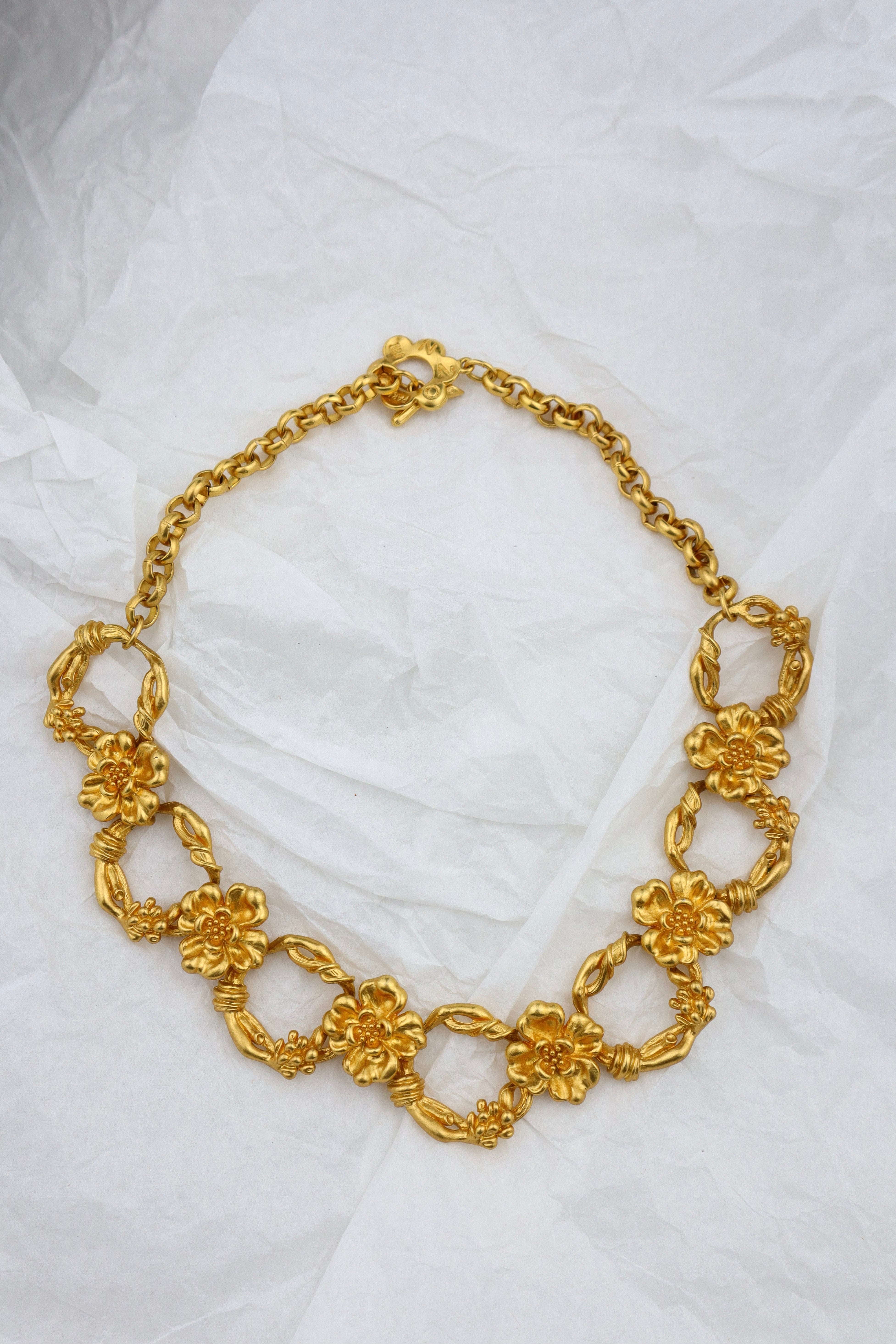 KENZO - złocona kolia z kwiecistych ogniw