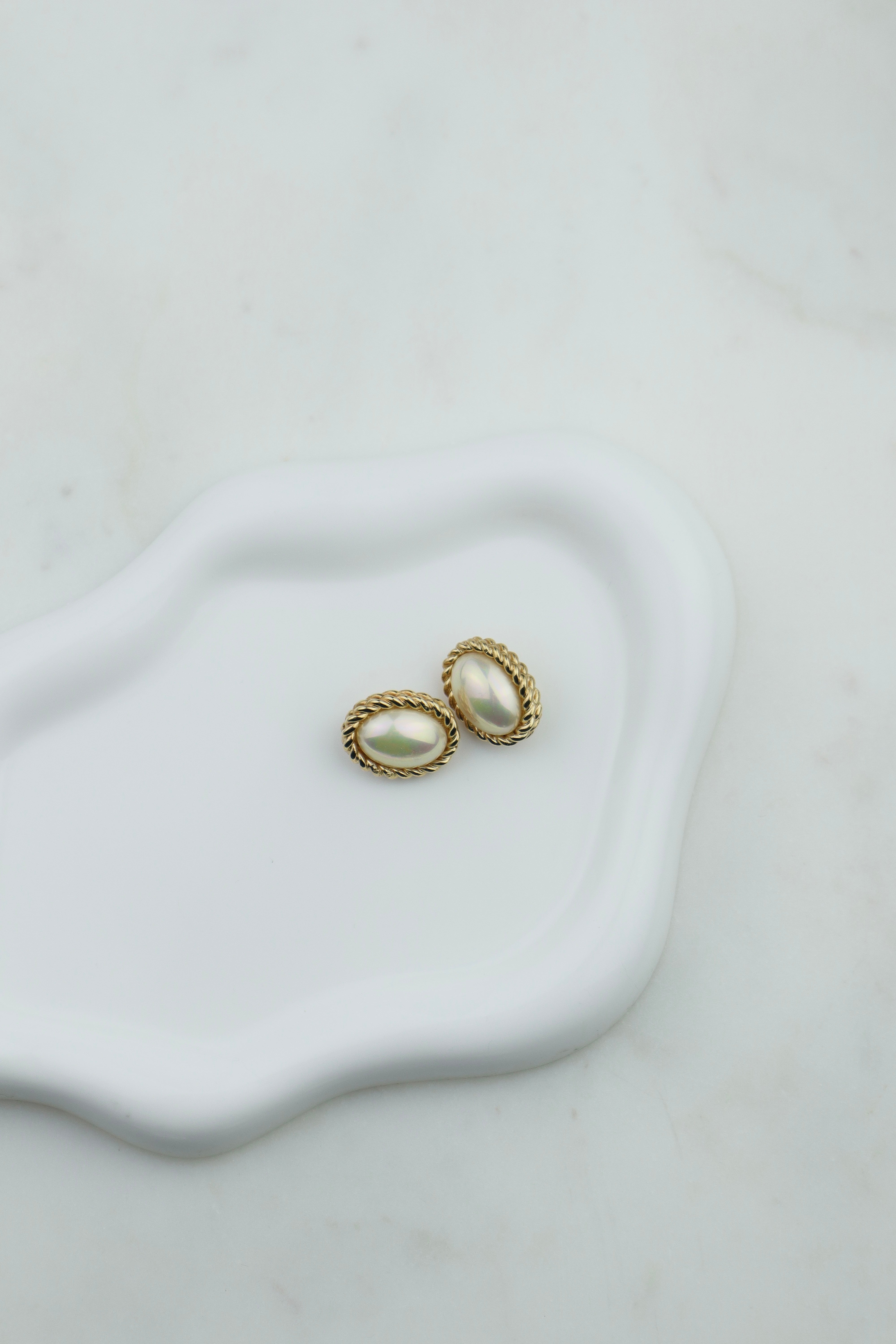 Christian Dior - owalne klipsy rope z perłą