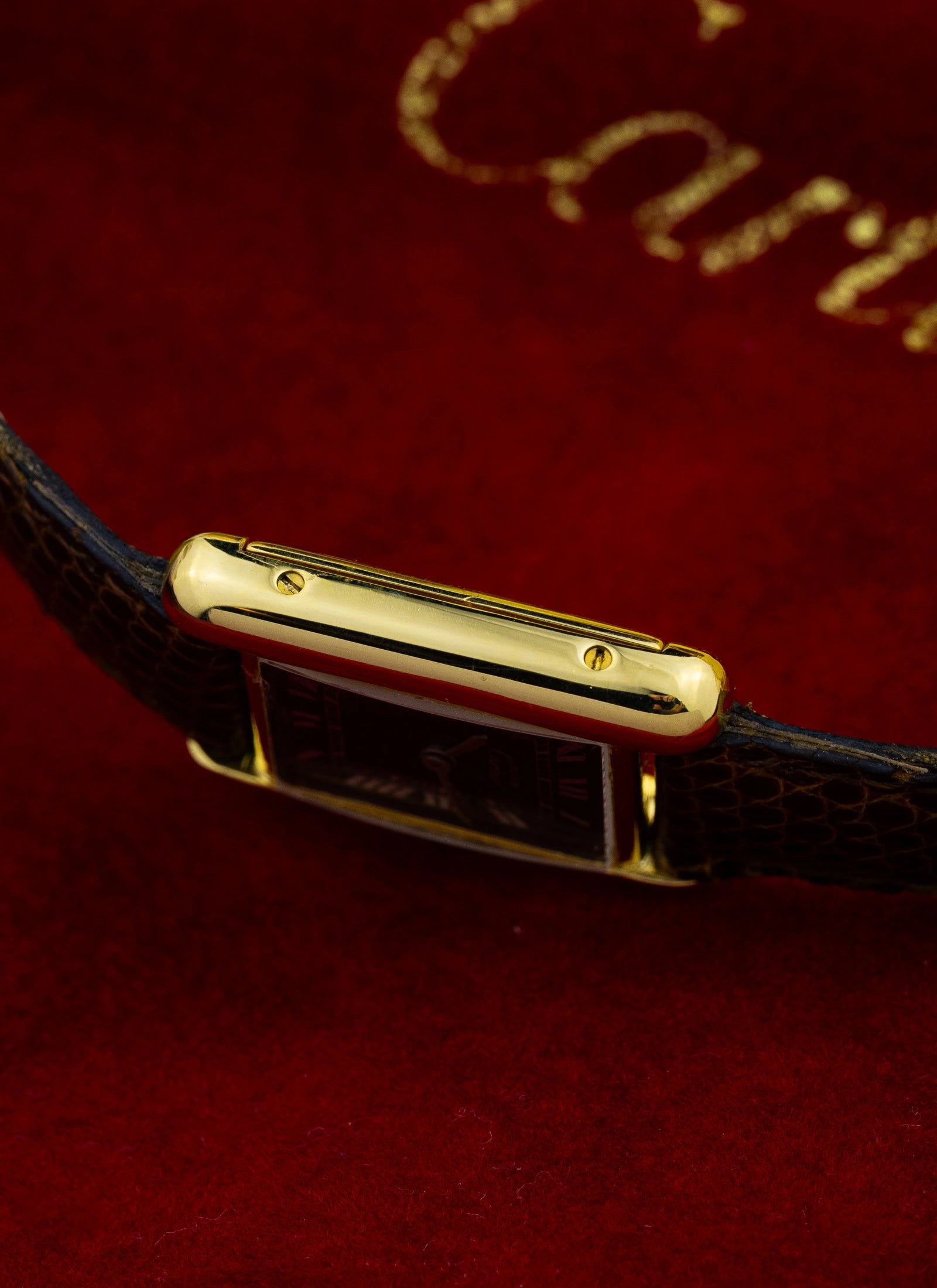 1980s Cartier Tank Vermeil Black Roman Dial