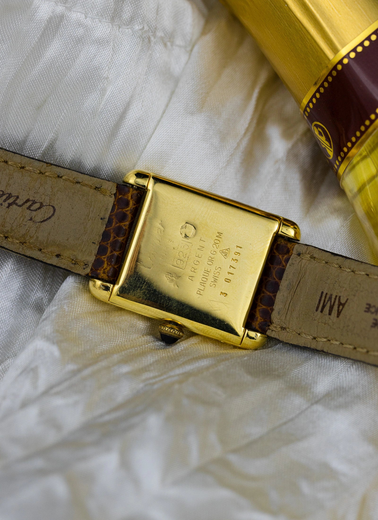 1980s Cartier Tank Vermeil Black Roman Dial