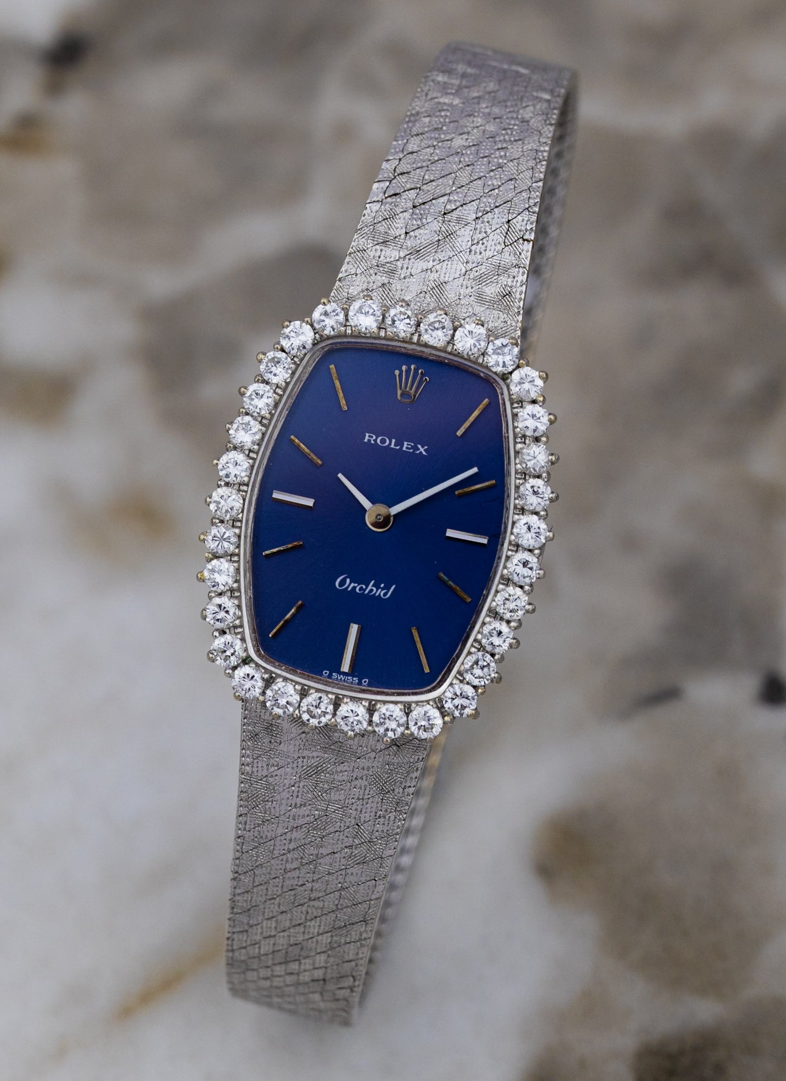 1975 18K Lady Rolex Orchid Navy Dial Diamond Bezel 2676