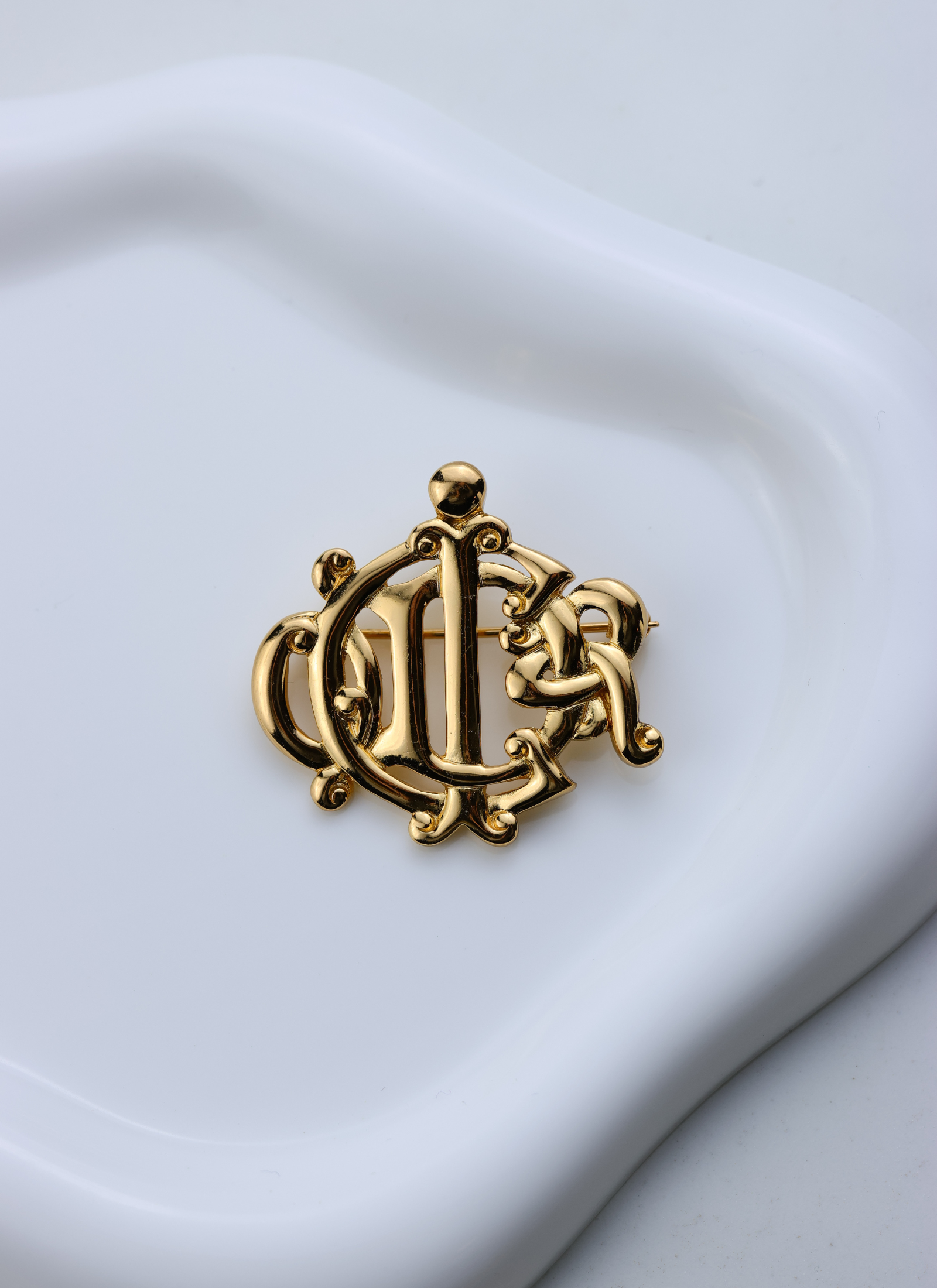 Christian Dior - broszka monogram