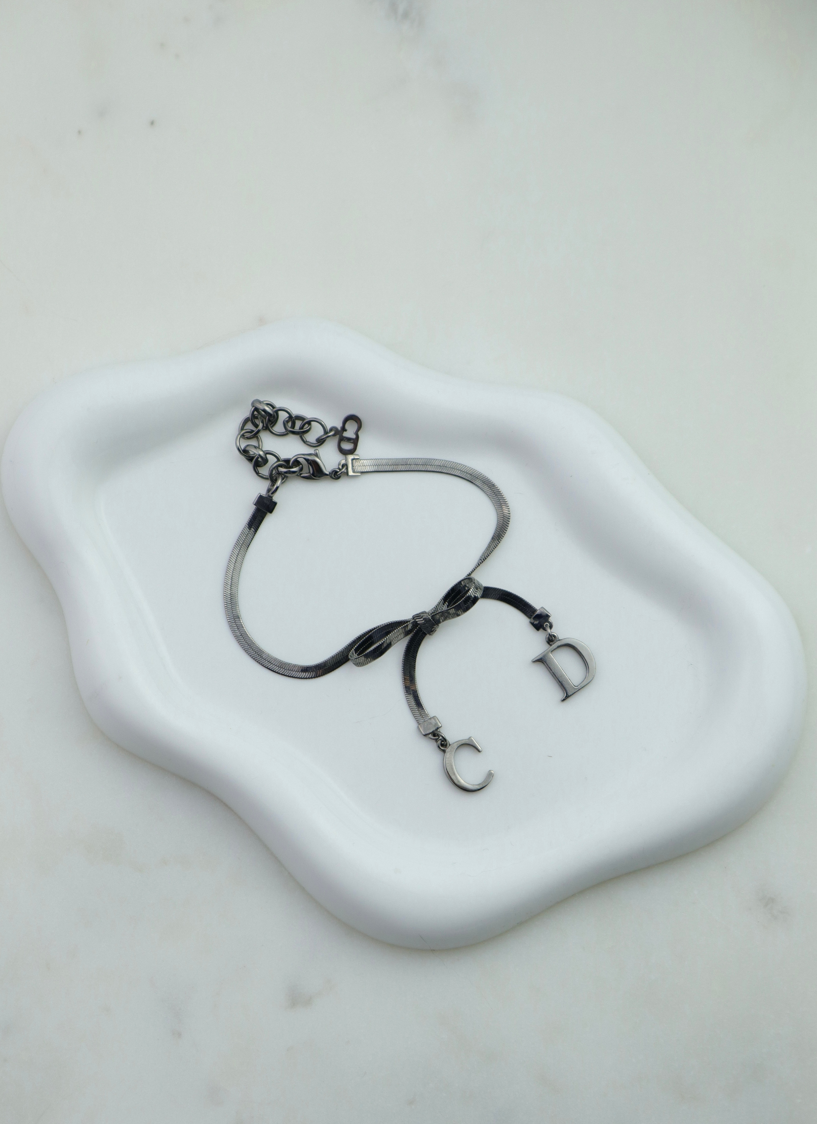 Christian Dior - bransoletka z logo CD